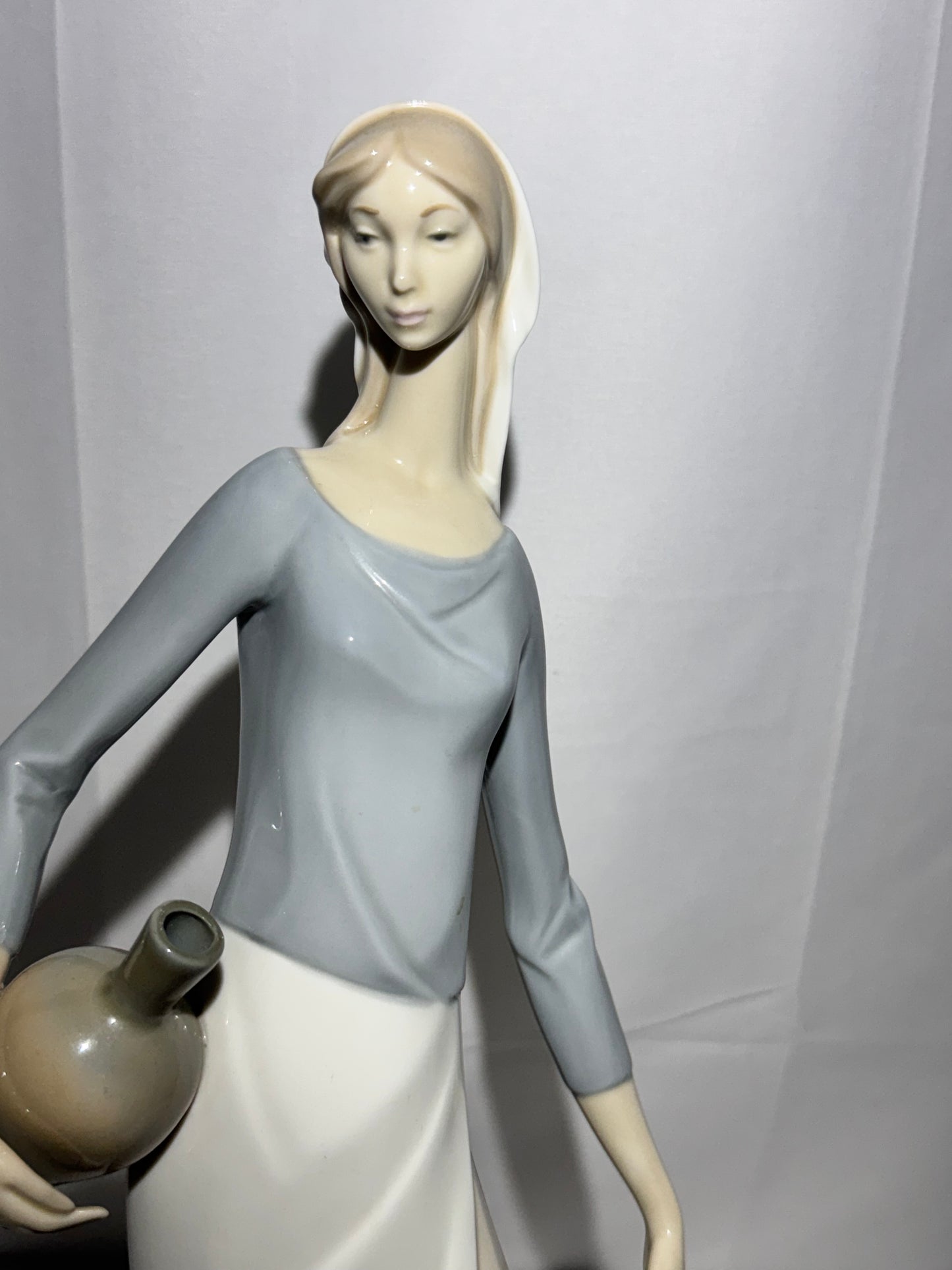 Lladro NAO Porcelain Figurine – “The Jug Carrier” (Water Carrier with Jugs) – Designed by Fulgencio Garcia, 1974