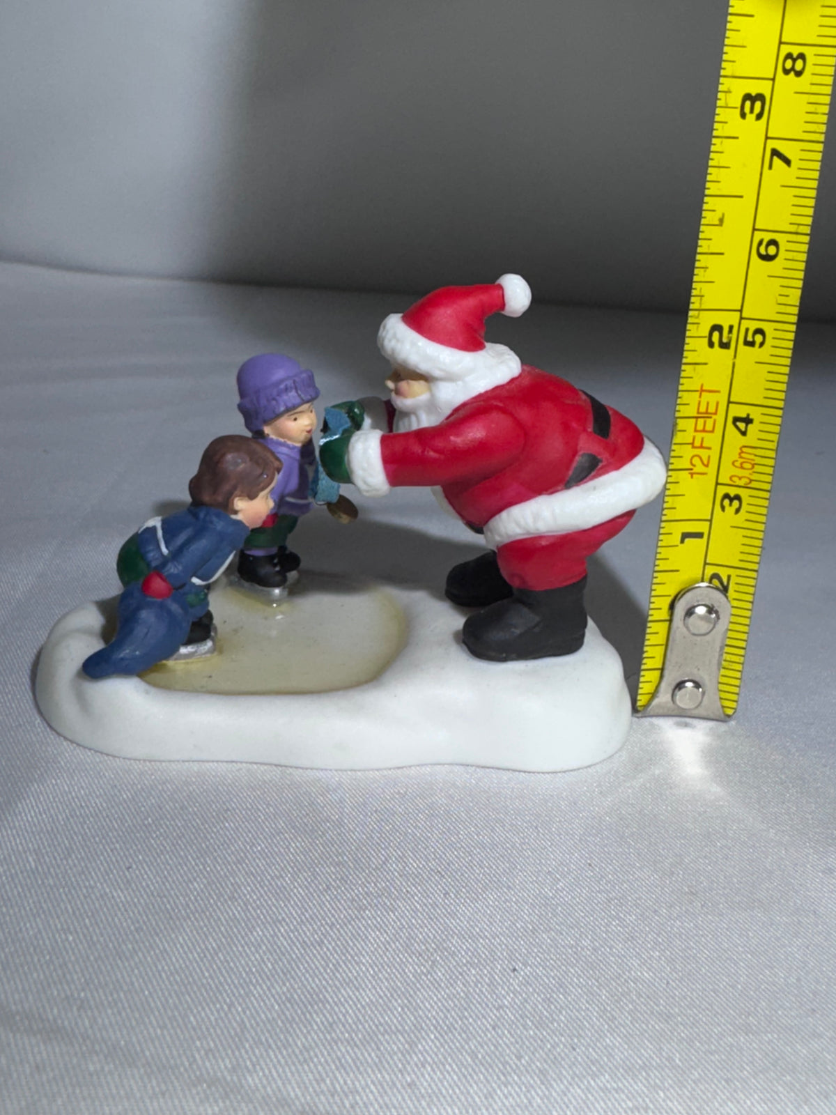 Department 56 North Pole Series Santa Awarding a Medal Replacement Figurine – 2002