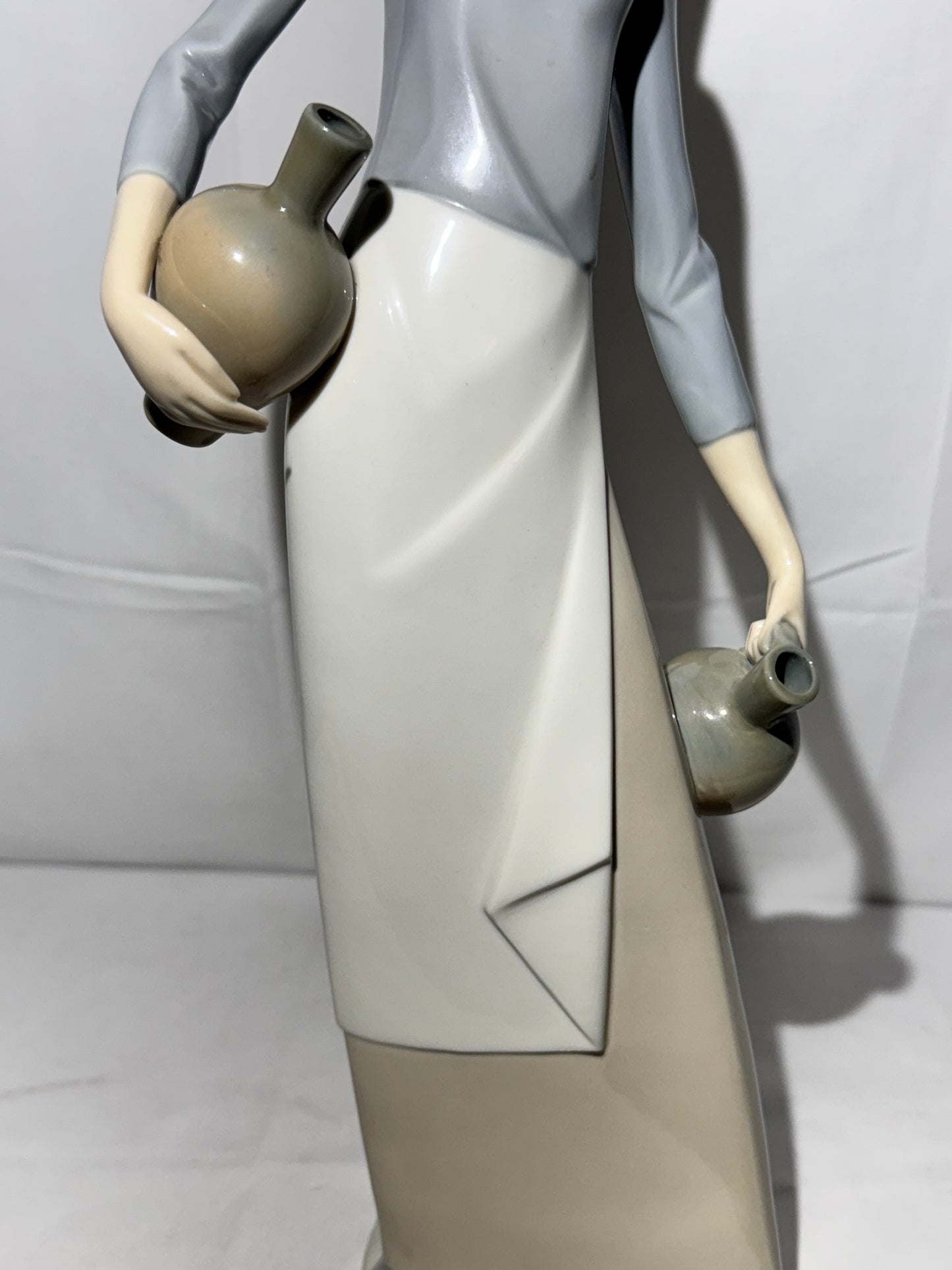 Lladro NAO Porcelain Figurine – “The Jug Carrier” (Water Carrier with Jugs) – Designed by Fulgencio Garcia, 1974