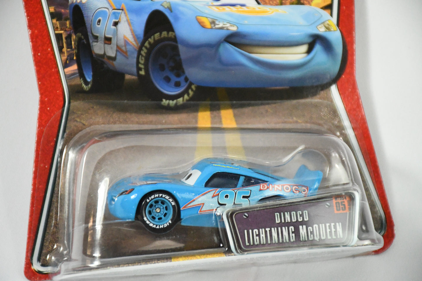 Cars - Pixar-Disney-Dinco #5 -Lightning McQueen- Blue w/ lightning bult 95- Radiator Springs- Die cast-M1054