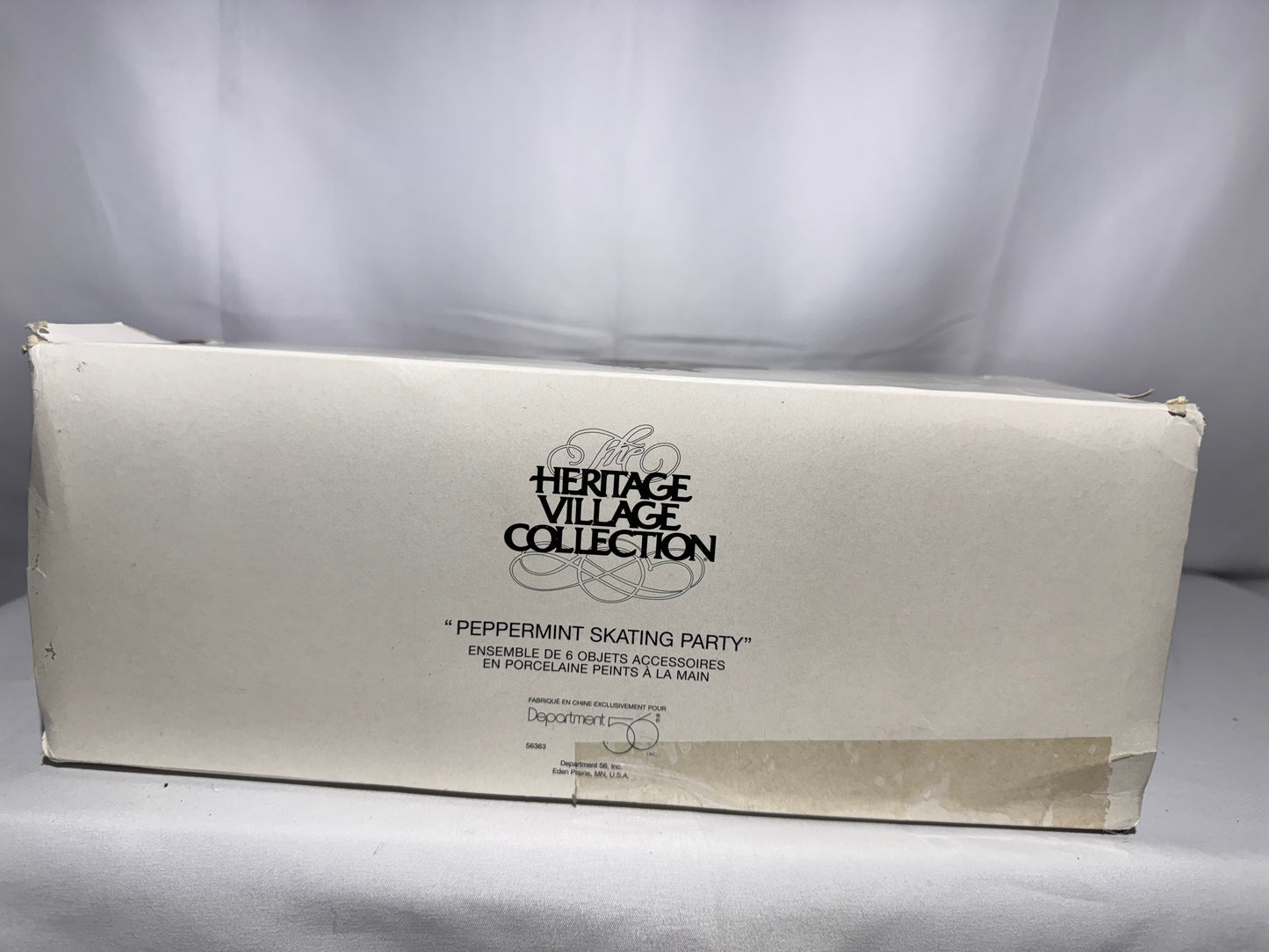 Department 56 Heritage Village Collection – “Peppermint Skating Party”Set of 6 – Item #56363