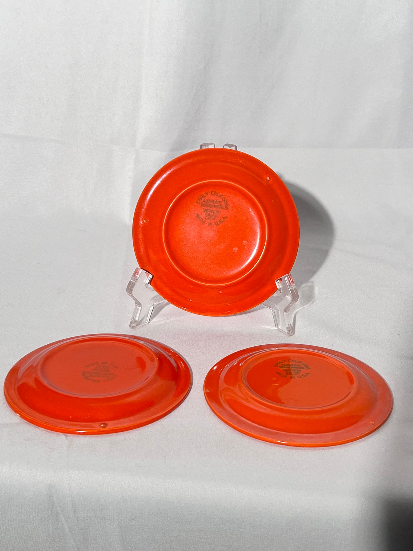 Bauer Pottery- vintage- orange- 4 1/2” saucers - set of 3 - Ring ware