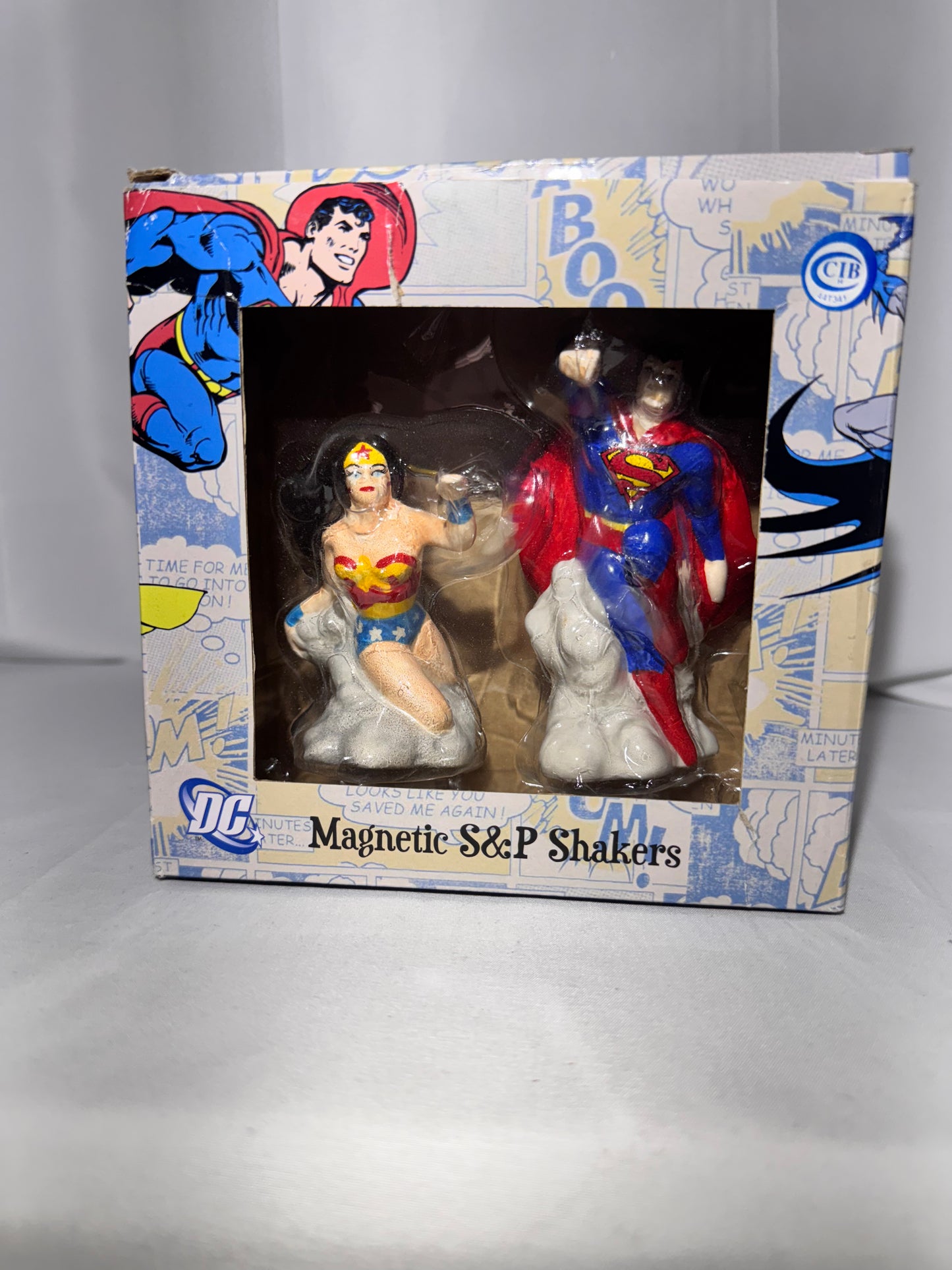 Superman and Wonder Woman-magnetic salt and pepper shakers-DC comics-Warner Brothers