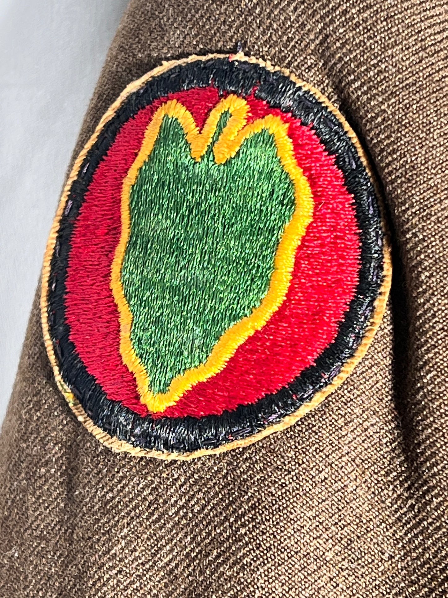 World War II lot - military uniform- dog tags- 2 duffel bags- decorated and patches on uniform