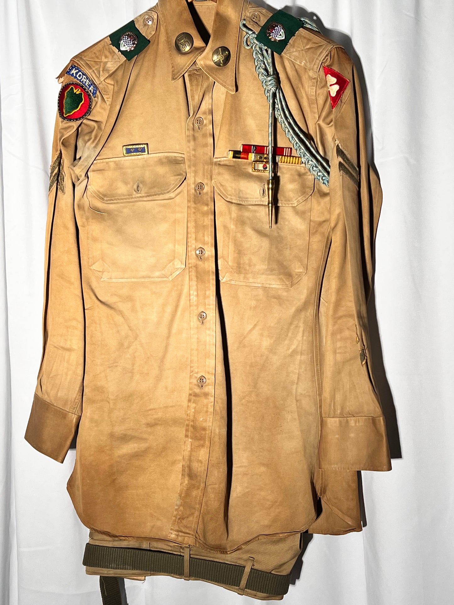 World War II lot - military uniform- dog tags- 2 duffel bags- decorated and patches on uniform