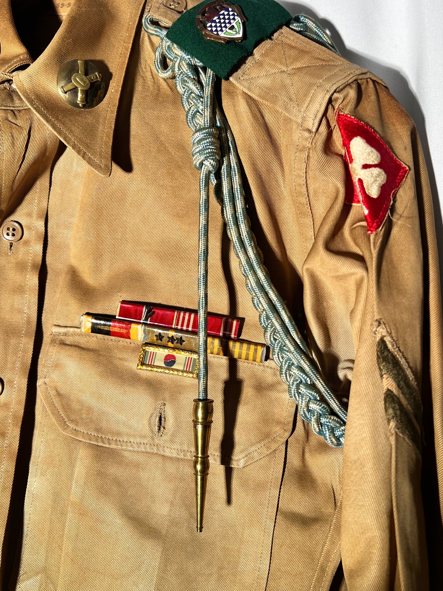 World War II lot - military uniform- dog tags- 2 duffel bags- decorated and patches on uniform