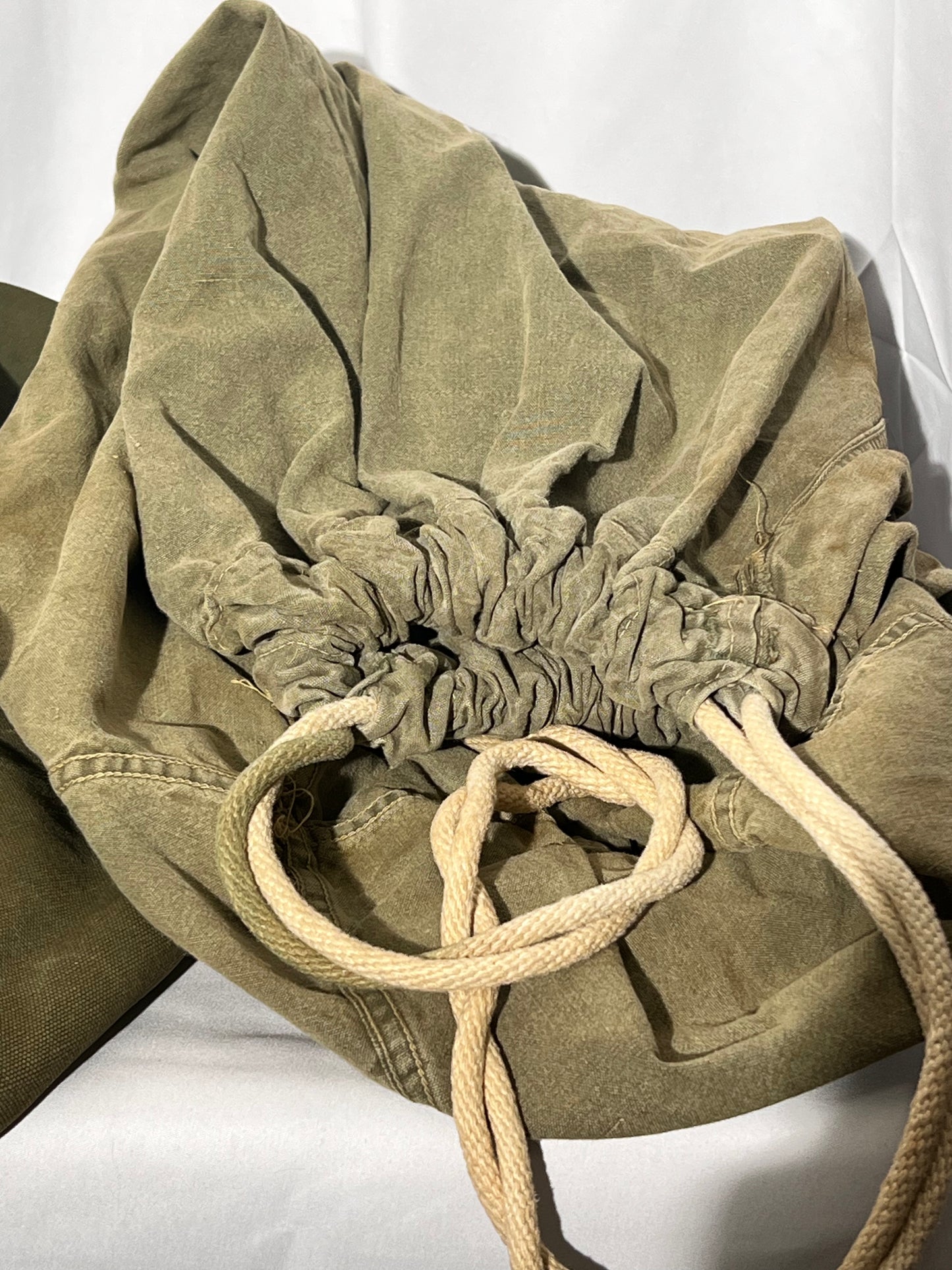 World War II lot - military uniform- dog tags- 2 duffel bags- decorated and patches on uniform