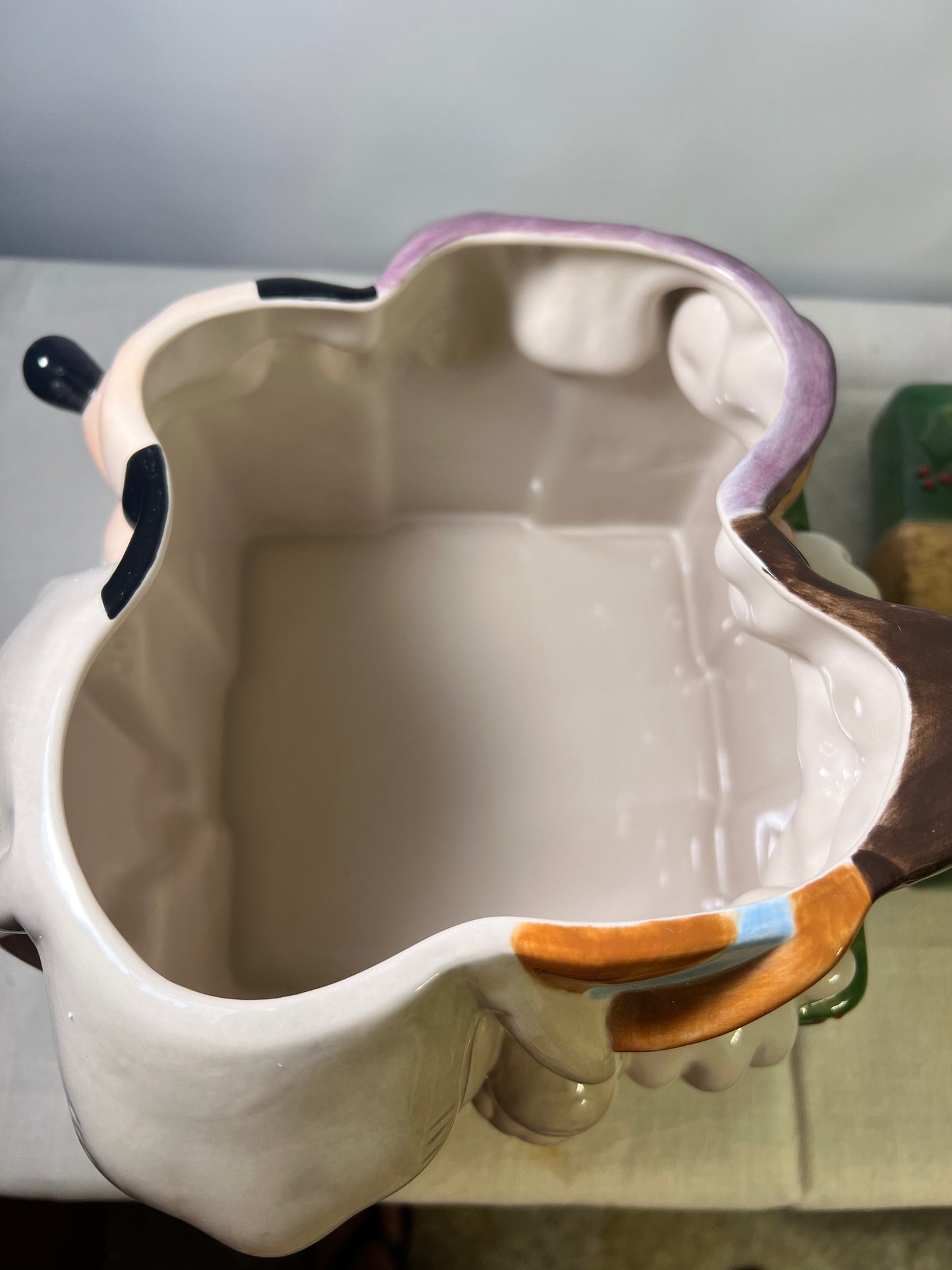 Dumbo, dopey, Pinocchio, and Mickey Mouse peeking out of a present -cookie jar-Disney-#25037
