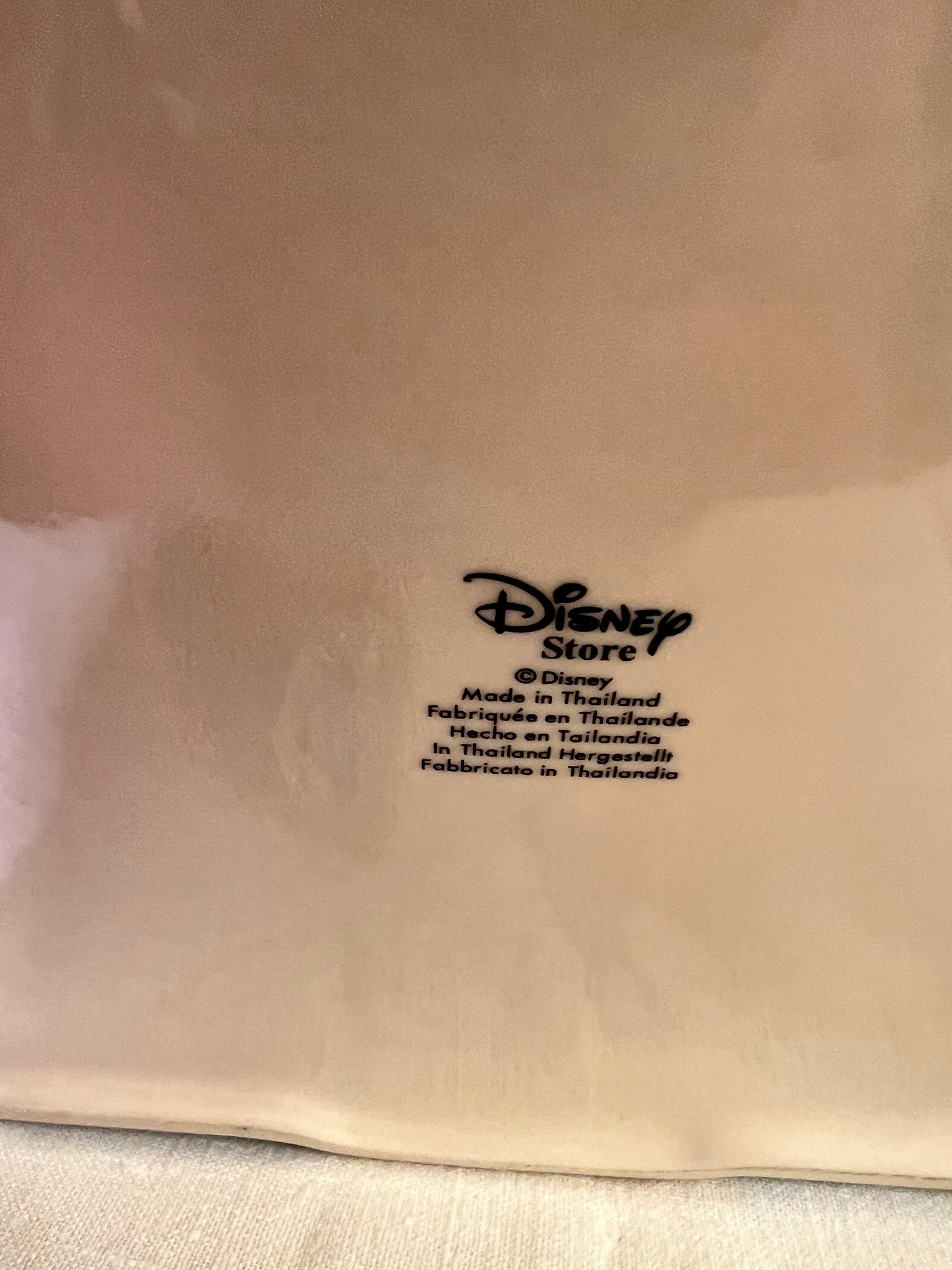 Dumbo, dopey, Pinocchio, and Mickey Mouse peeking out of a present -cookie jar-Disney-#25037