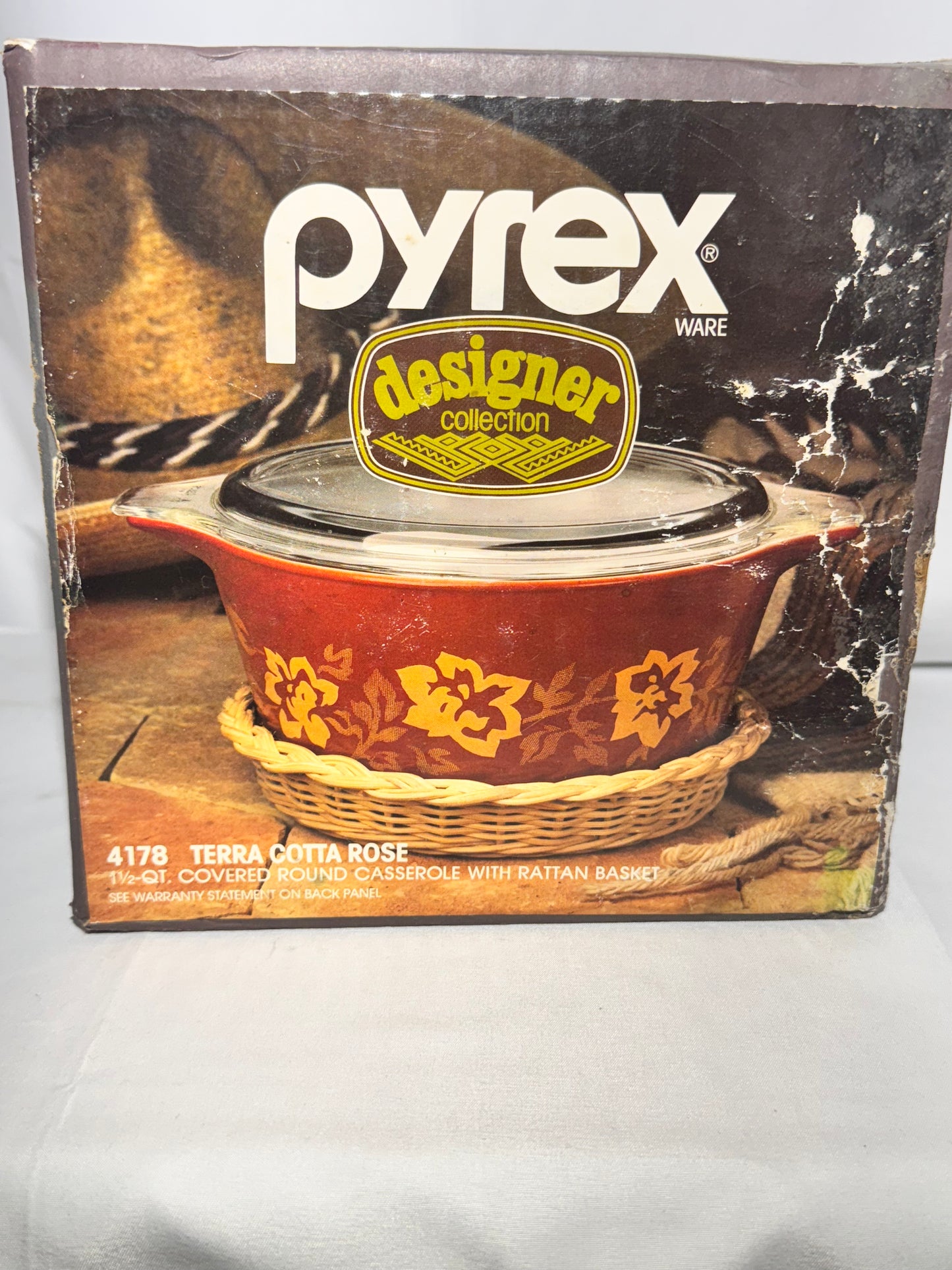 Pyrex- Terra Cotta Rose - 1 1/5 QT. Covered round casserole with rattan basket-item 4177-Corningware