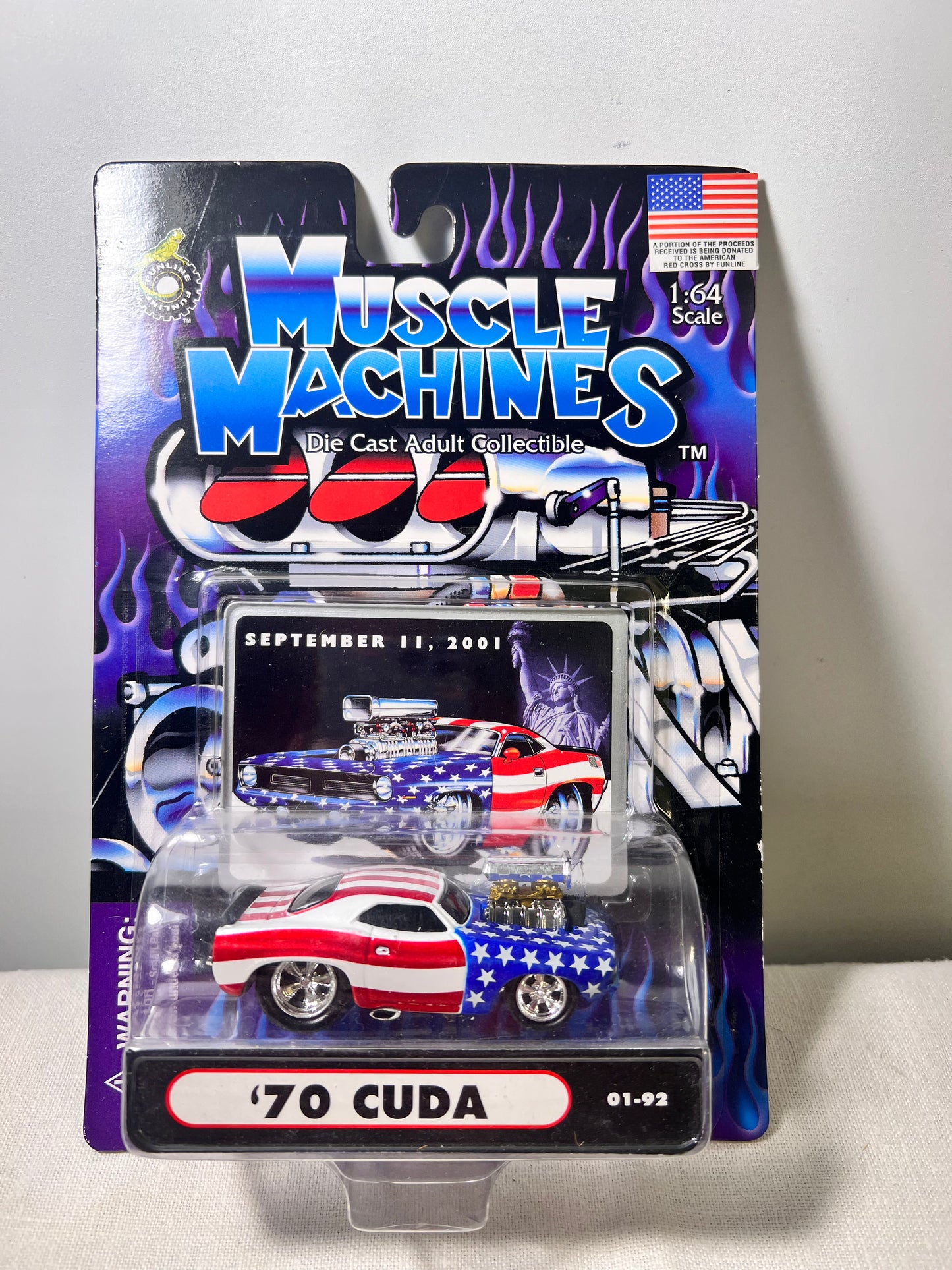 Muscle machines-‘70 Cuda - 01-92- American flag- September 11, 2001- 1:64 Scale- Die cast car -NIB