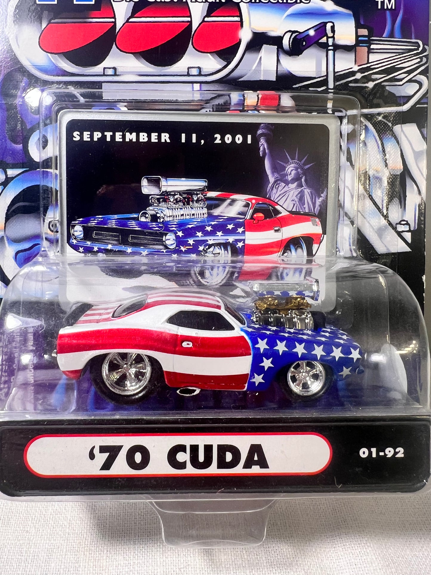 Muscle machines-‘70 Cuda - 01-92- American flag- September 11, 2001- 1:64 Scale- Die cast car -NIB