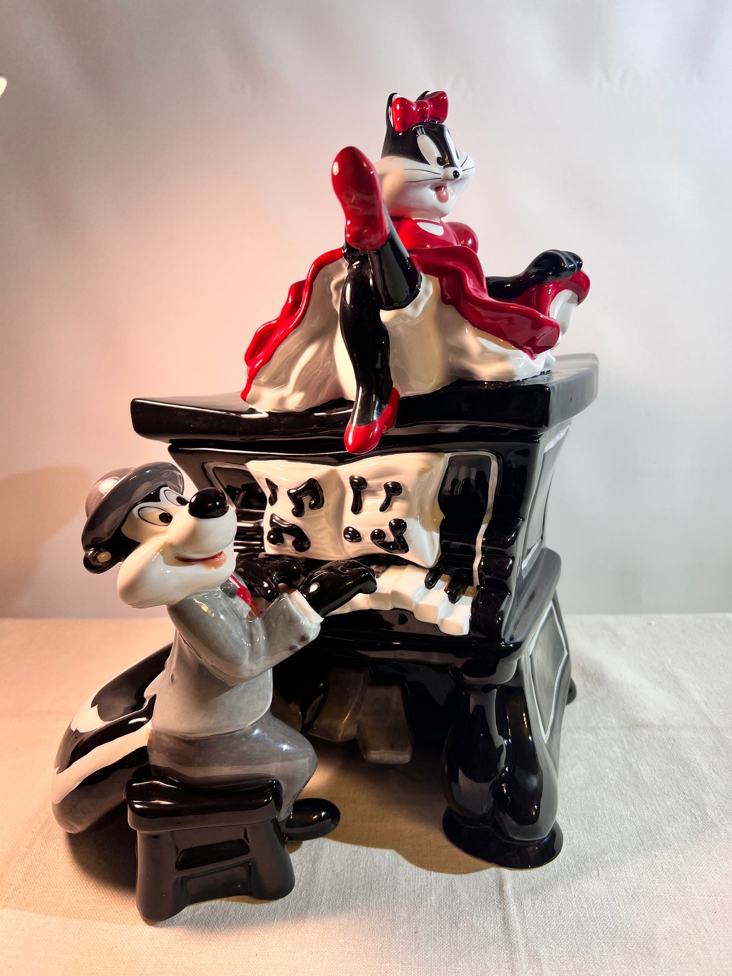 Pepe Le Pew & Penelope playing piano- 12 1/2” Cookie jar- Warner Brothers- 1999