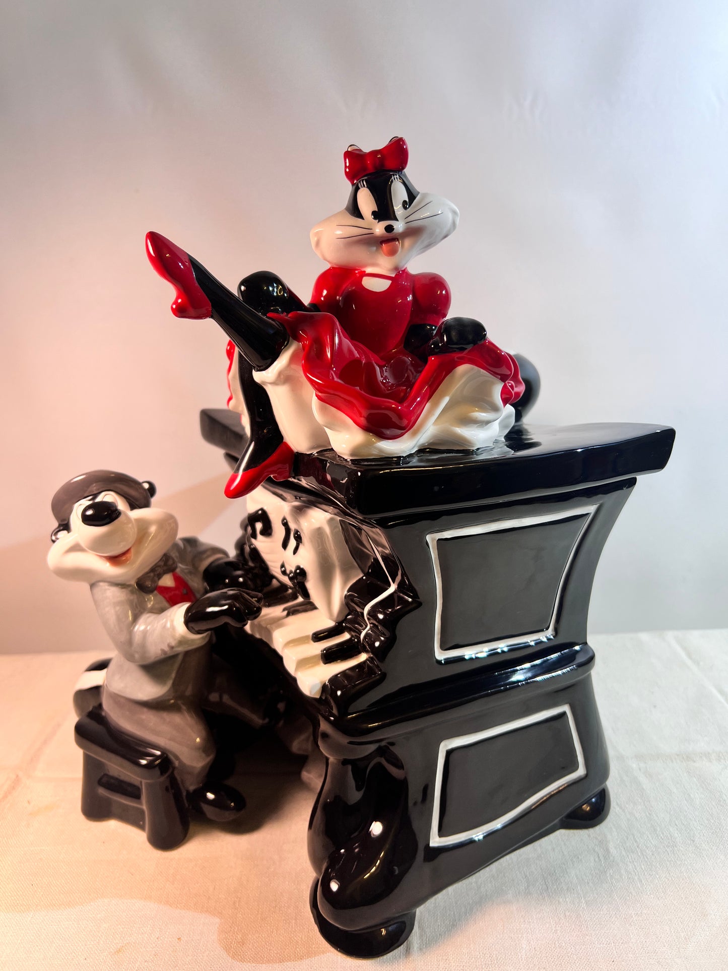 Pepe Le Pew & Penelope playing piano- 12 1/2” Cookie jar- Warner Brothers- 1999