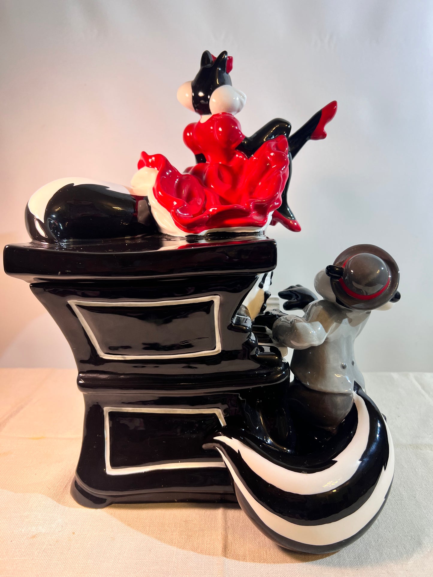 Pepe Le Pew & Penelope playing piano- 12 1/2” Cookie jar- Warner Brothers- 1999