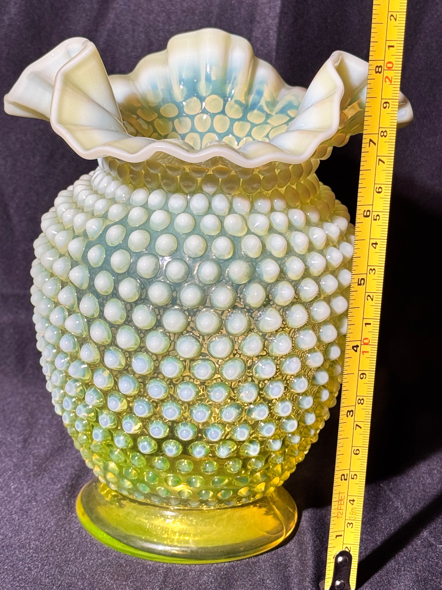 Uranium- Fenton- 8” Flower Vase - topaz opalescent hobnail with a ruffled rim