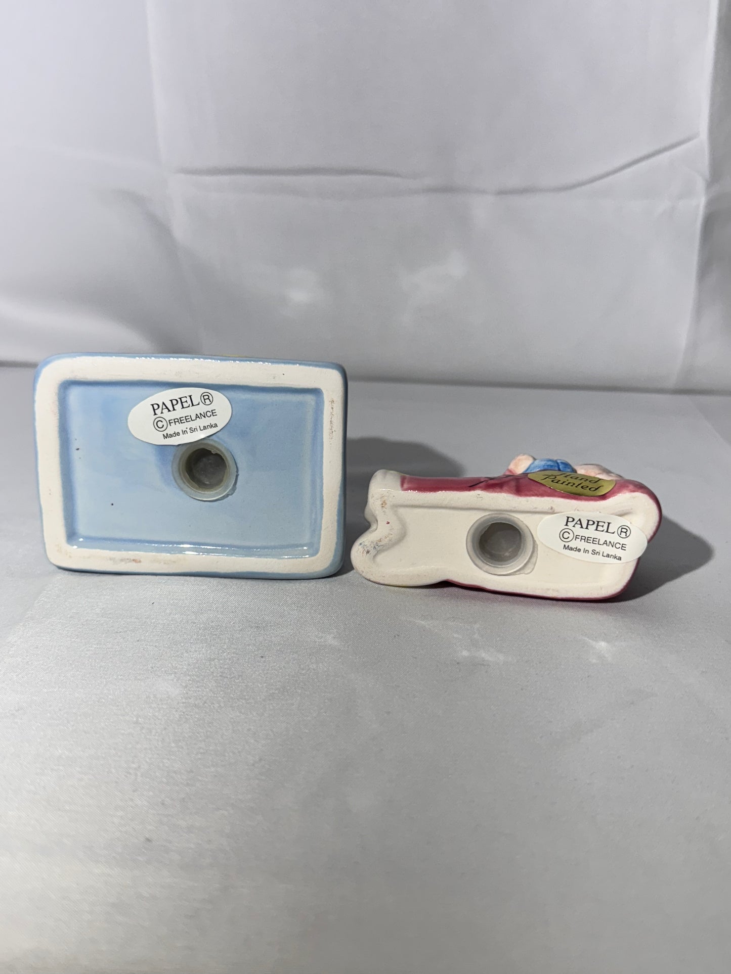 Cathy Buiewite - Salt and Pepper shakers - Papel - Hand painted- made in Sri Lanka- “Born to order in”