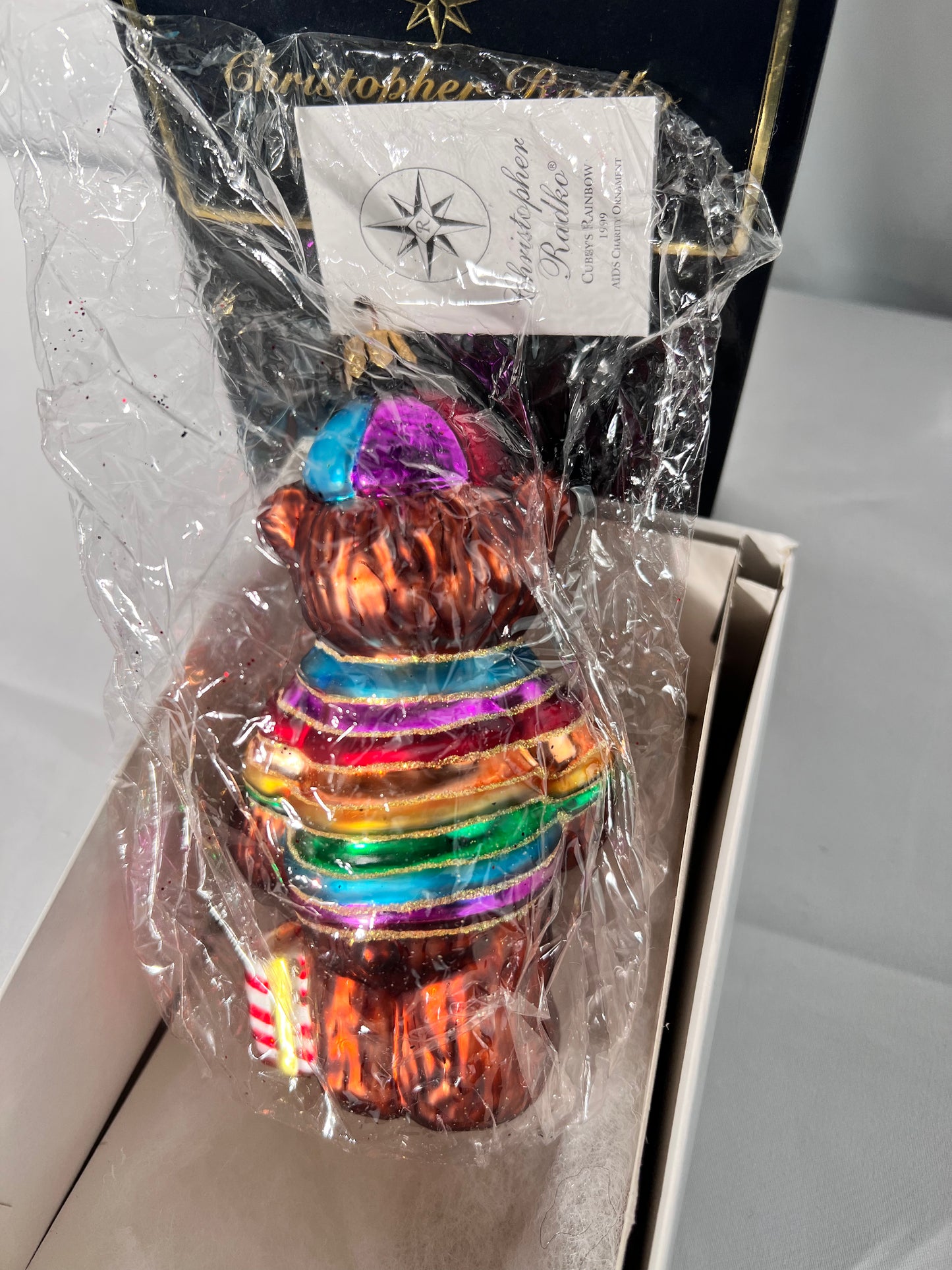 Radko - 1999 Cubby’s Rainbow- aids charity Ornament- 508344