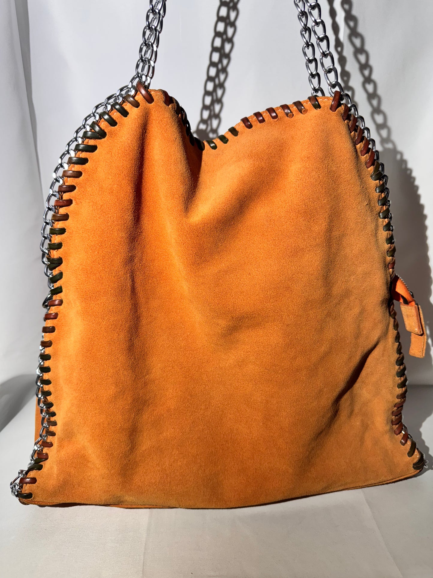 Stylish Orange Leather Handbag with Chain Straps – Gently Used