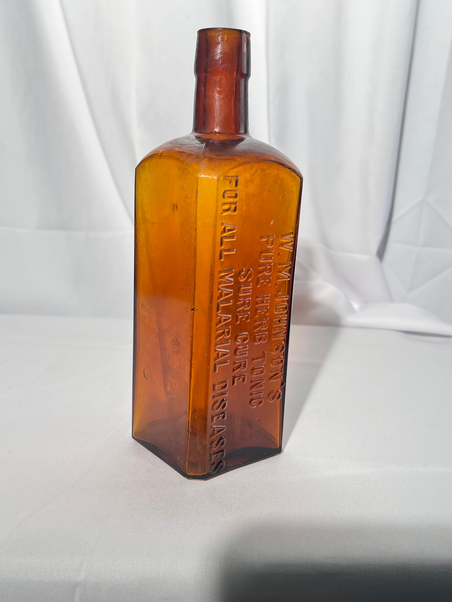 Antique Medicine Bottle - 9” W.M. Johnson’s - Pure Herb Tonic- Sure Cure - For All Malarial Diseases - Amber glass