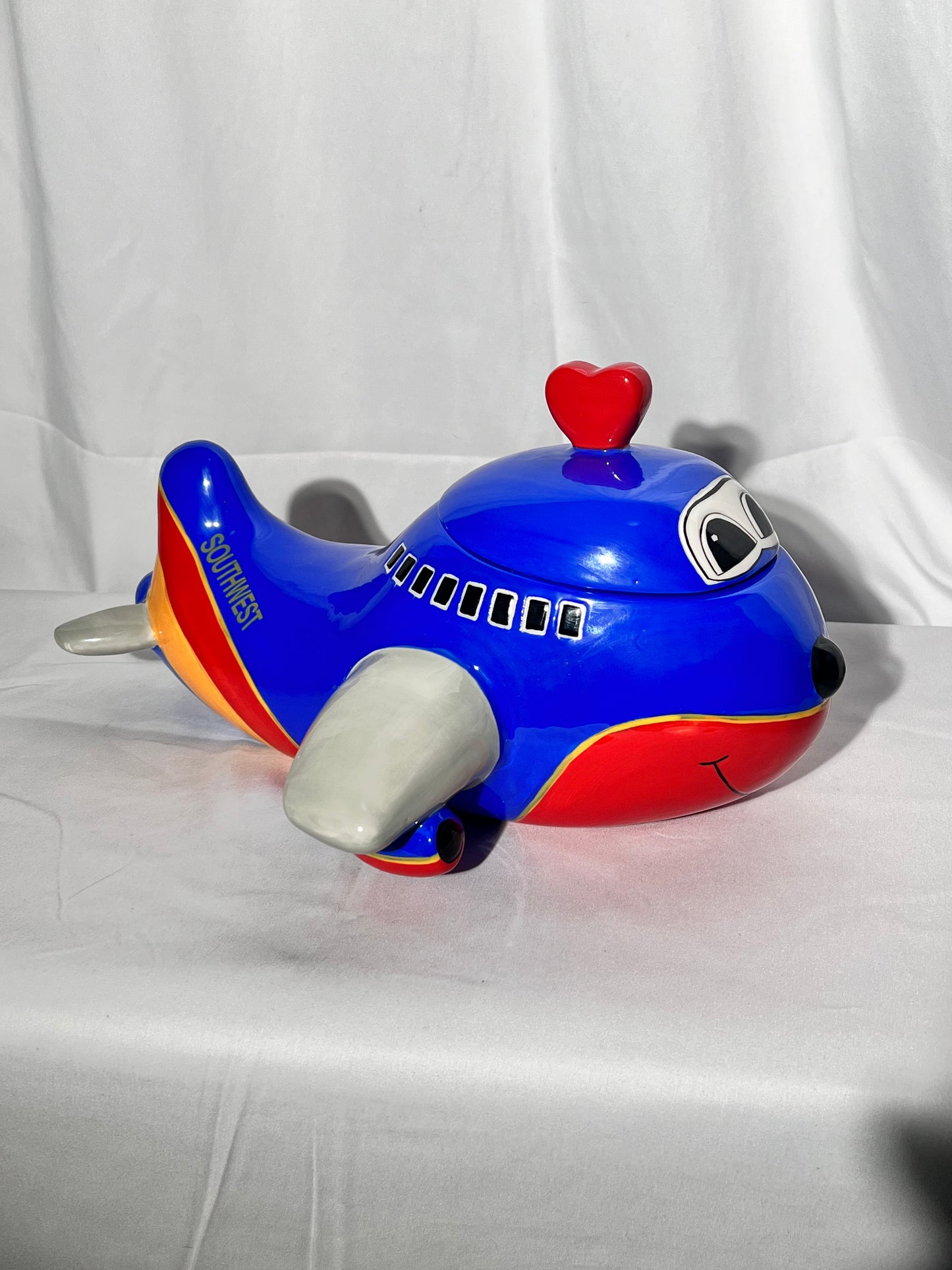 Southwest Airlines Airplane- 7 1/2” cookie jar - 2006 Creata- Blue red and yellow