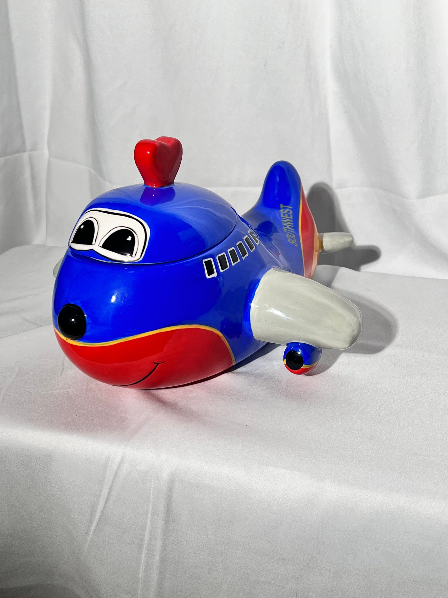 Southwest Airlines Airplane- 7 1/2” cookie jar - 2006 Creata- Blue red and yellow