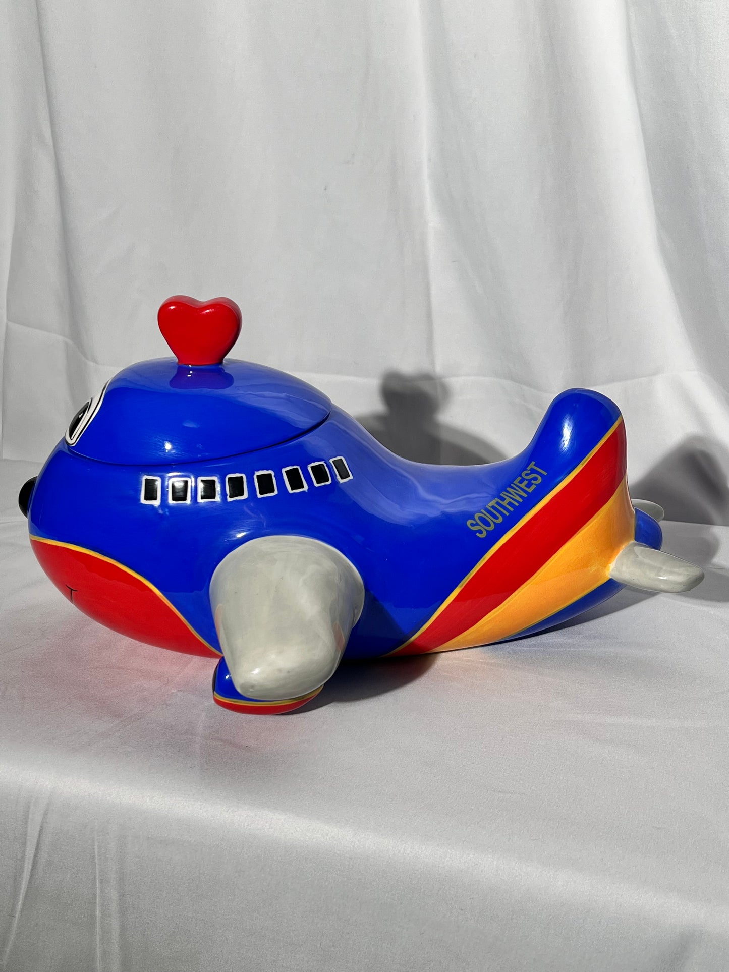 Southwest Airlines Airplane- 7 1/2” cookie jar - 2006 Creata- Blue red and yellow