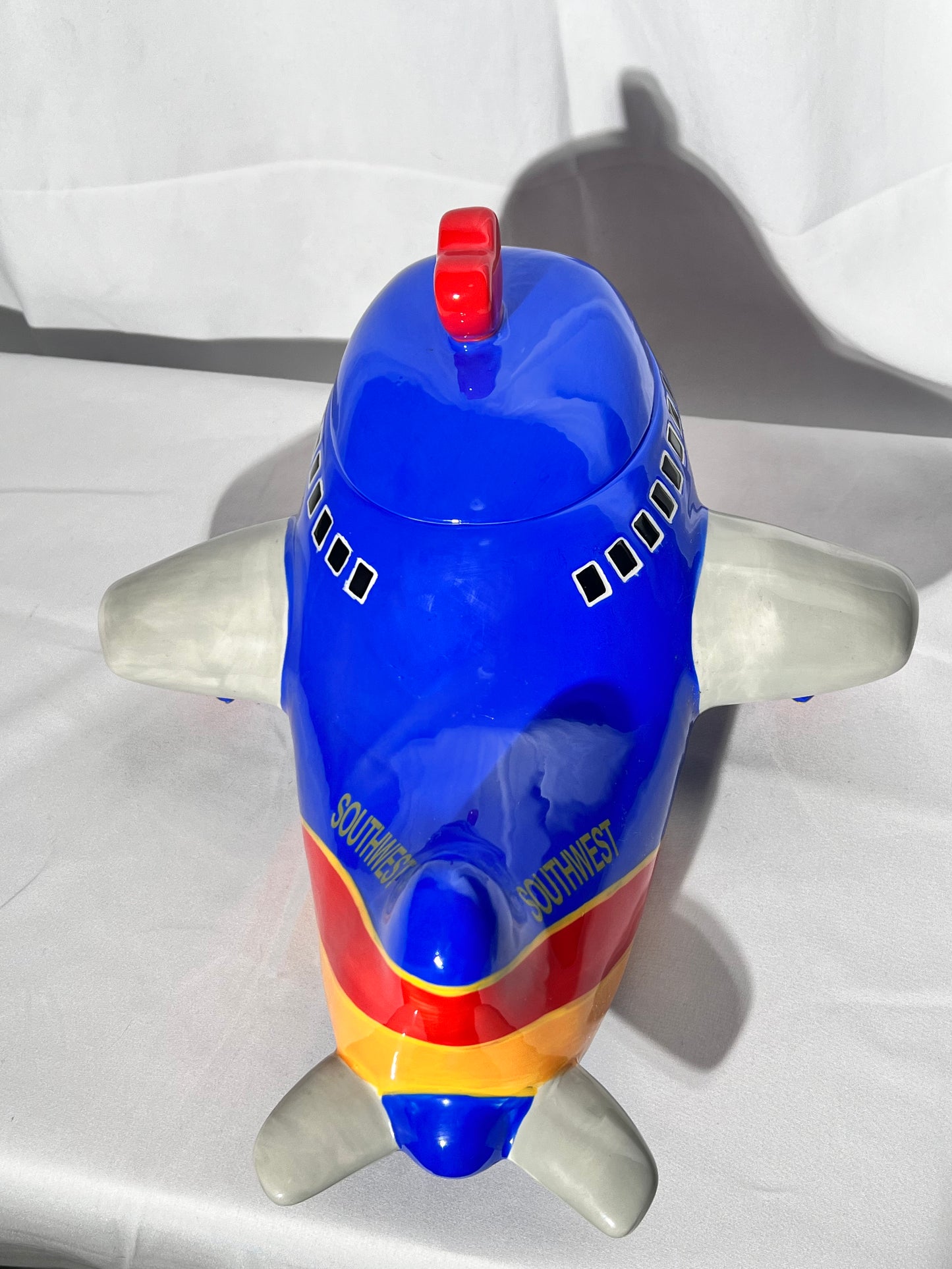 Southwest Airlines Airplane- 7 1/2” cookie jar - 2006 Creata- Blue red and yellow