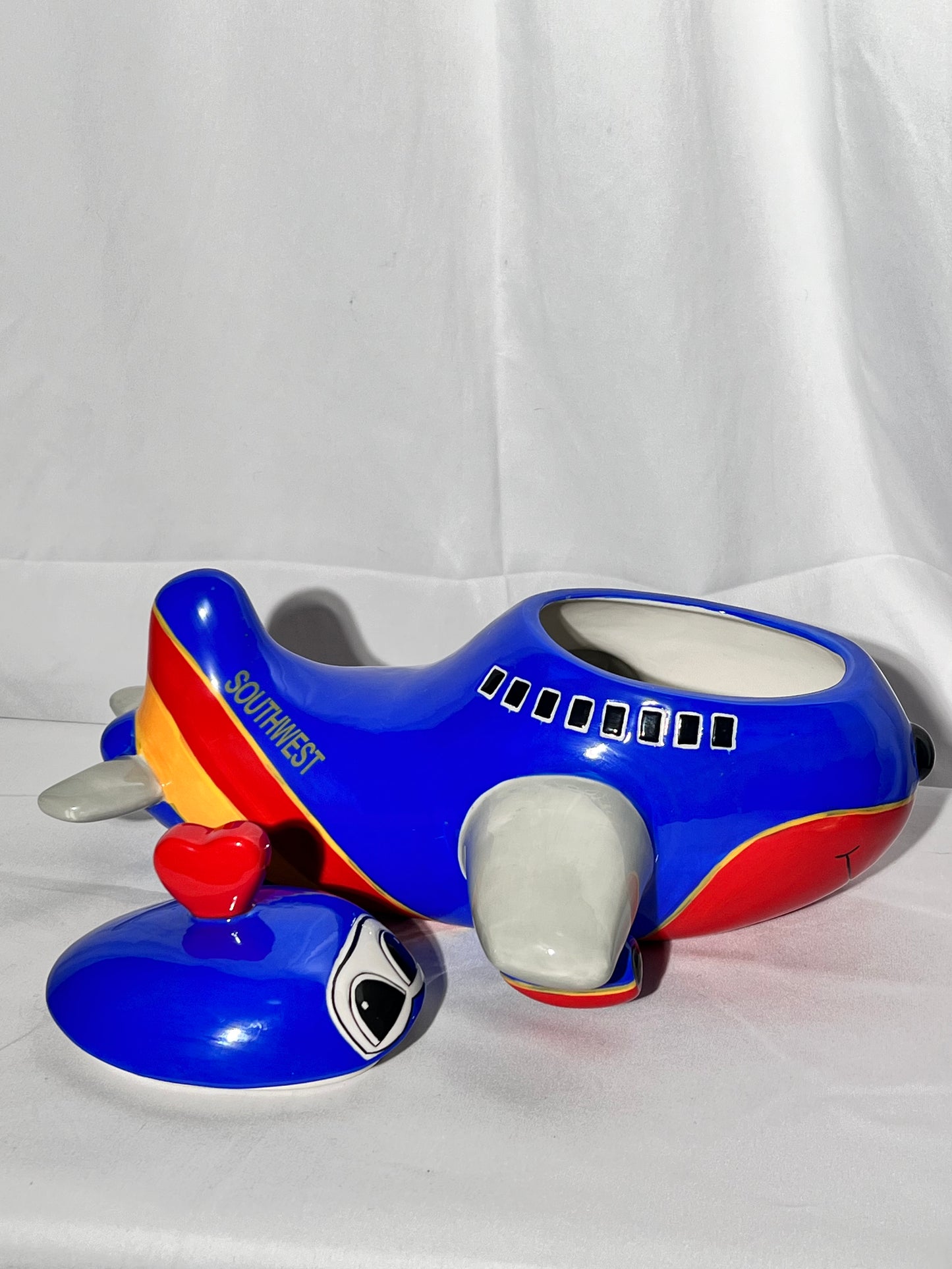 Southwest Airlines Airplane- 7 1/2” cookie jar - 2006 Creata- Blue red and yellow