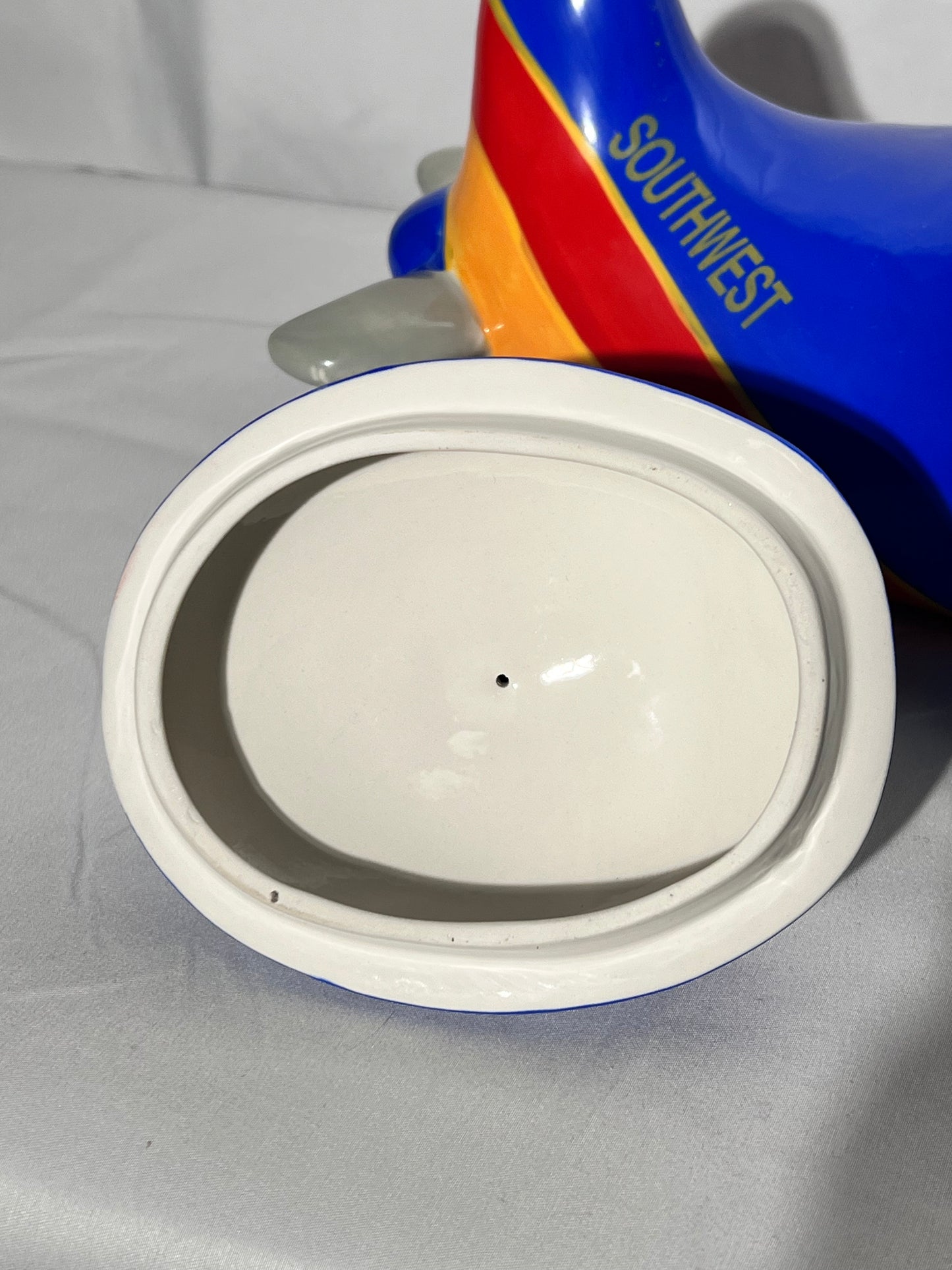 Southwest Airlines Airplane- 7 1/2” cookie jar - 2006 Creata- Blue red and yellow