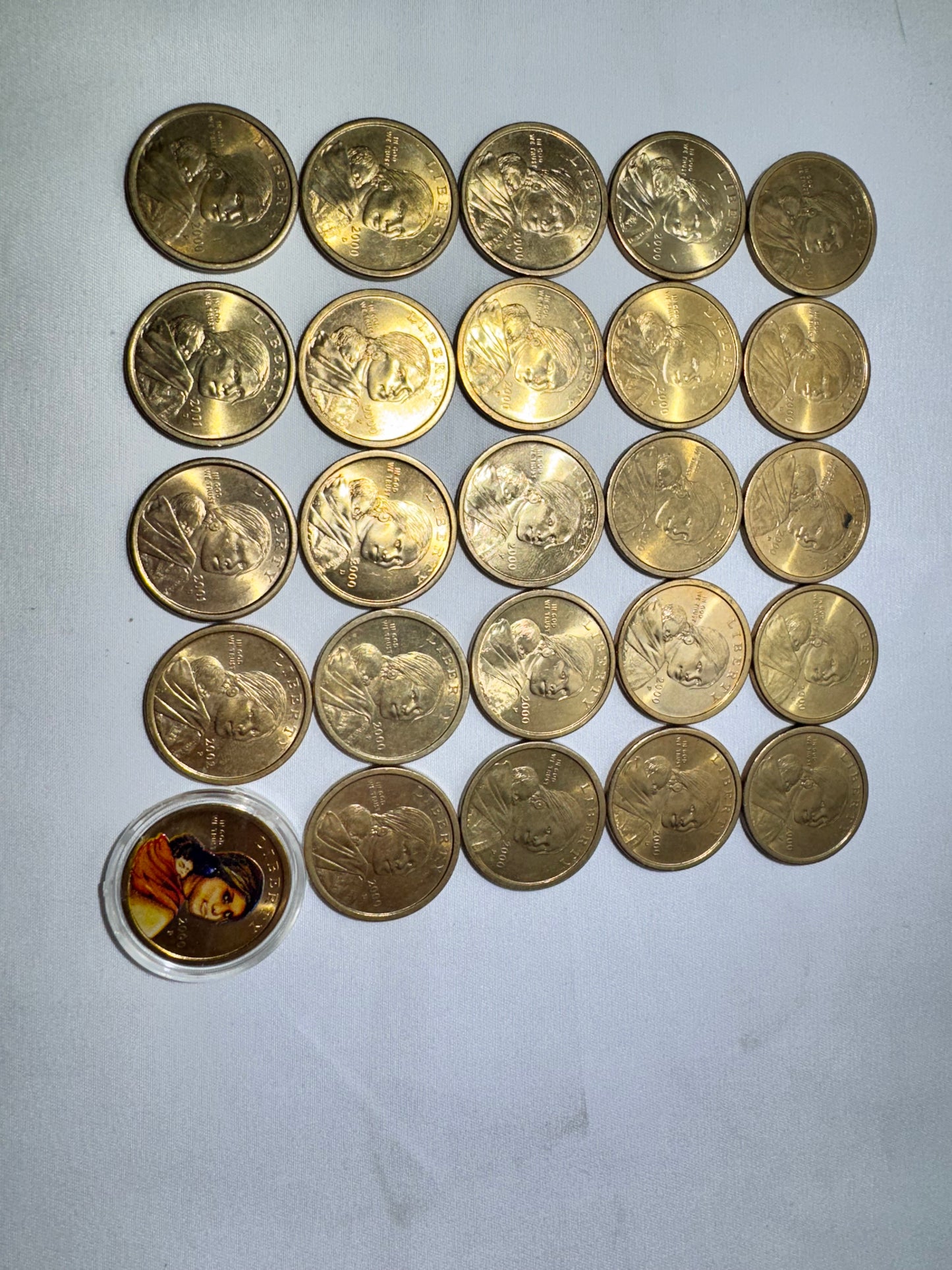 Lot of 25 United States Sacagawea One Dollar Coins – 2000, 2001 & 2002 – One Colorized Coin Included
