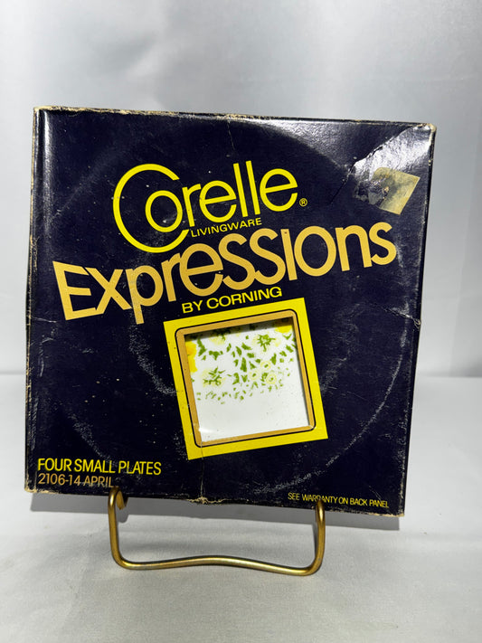 vintage boxed set of four Corelle Livingware Expressions small plates in the “April” pattern (2106-14) by Corning