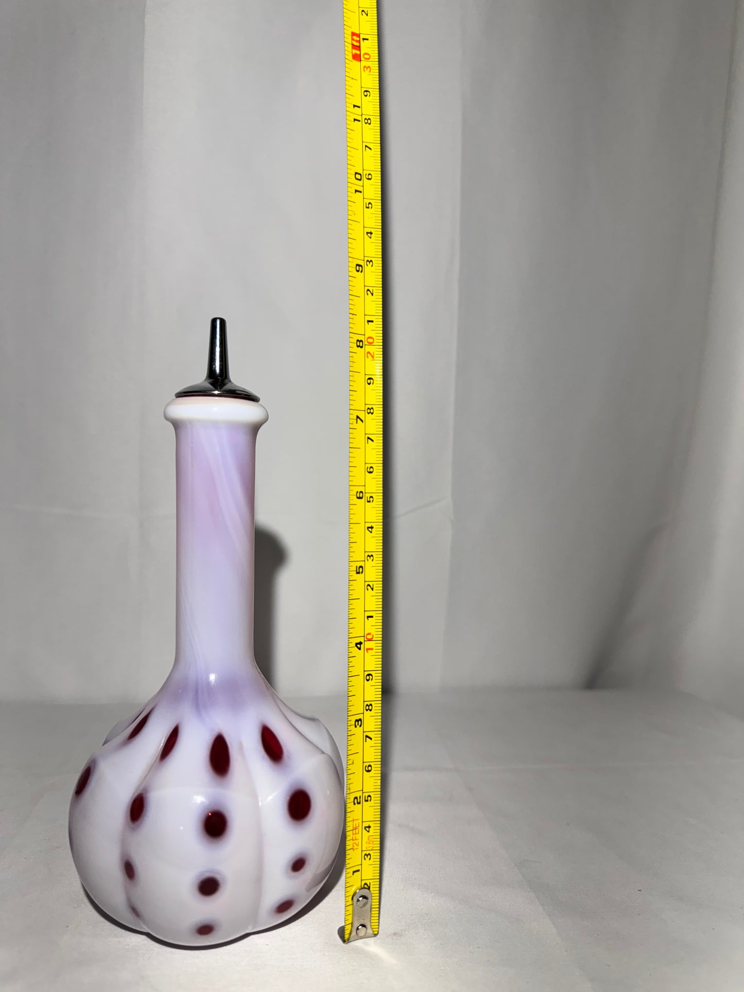 Vintage Barber Bottle – White & Cranberry Coin Pattern with Original Topper