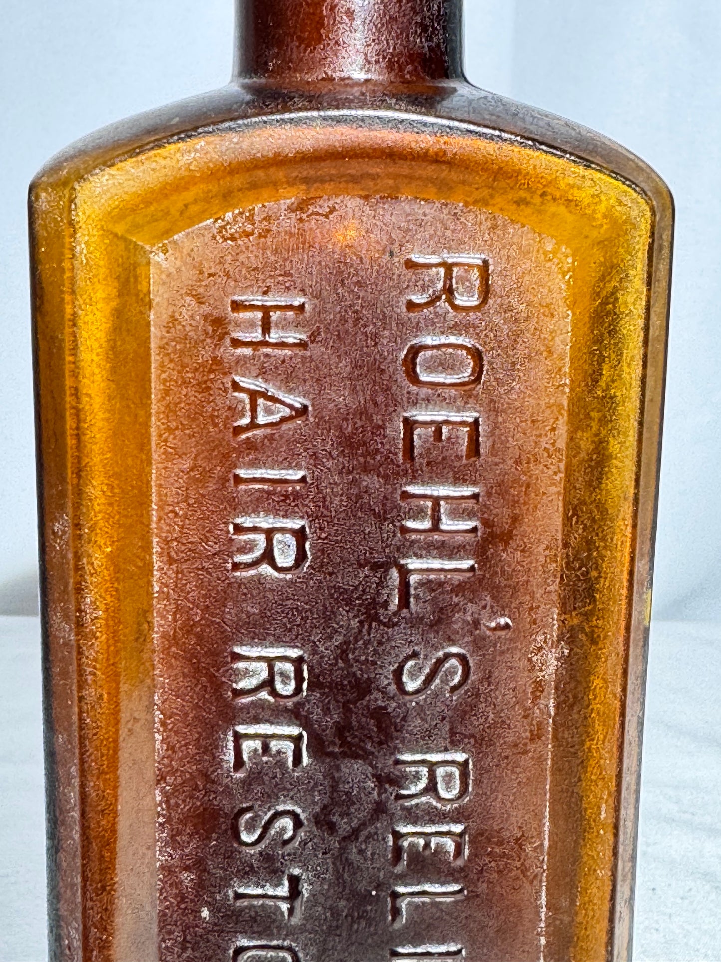 Vintage Amber Glass Apothecary Bottle Roehl’s Reliable Hair Restorer Embossed Antique