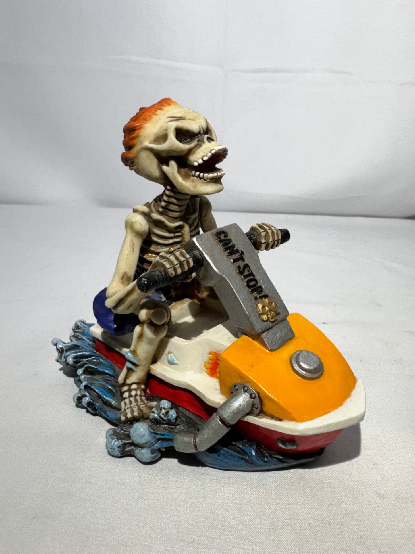 Summit Collection Skeleton “Can’t Stop” Jet Ski Figurine – American Flag Swim Shorts