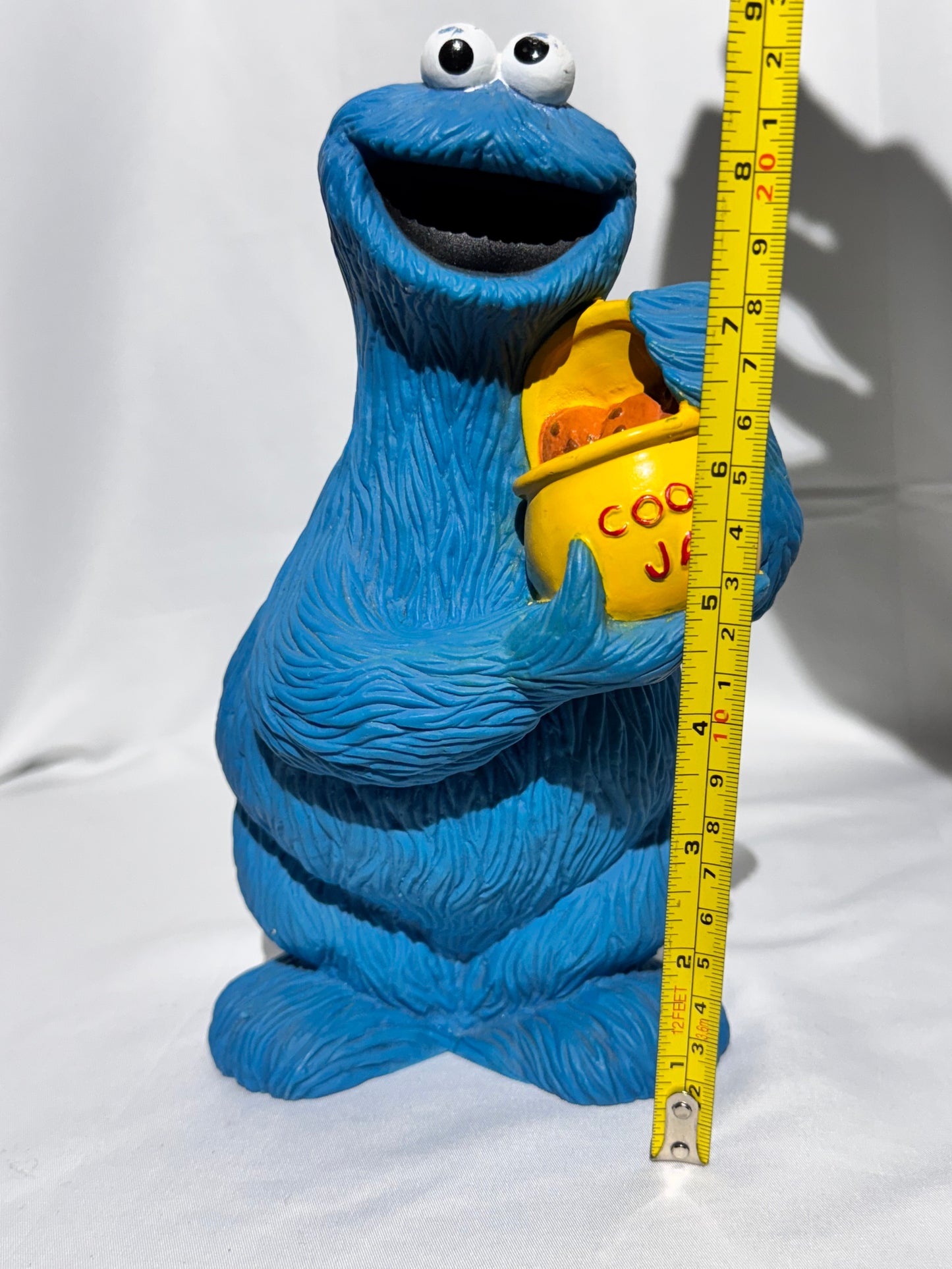 Sesame Street Cookie Monster Vinyl Piggy Bank w/ Cookie Jar – Muppets Inc.