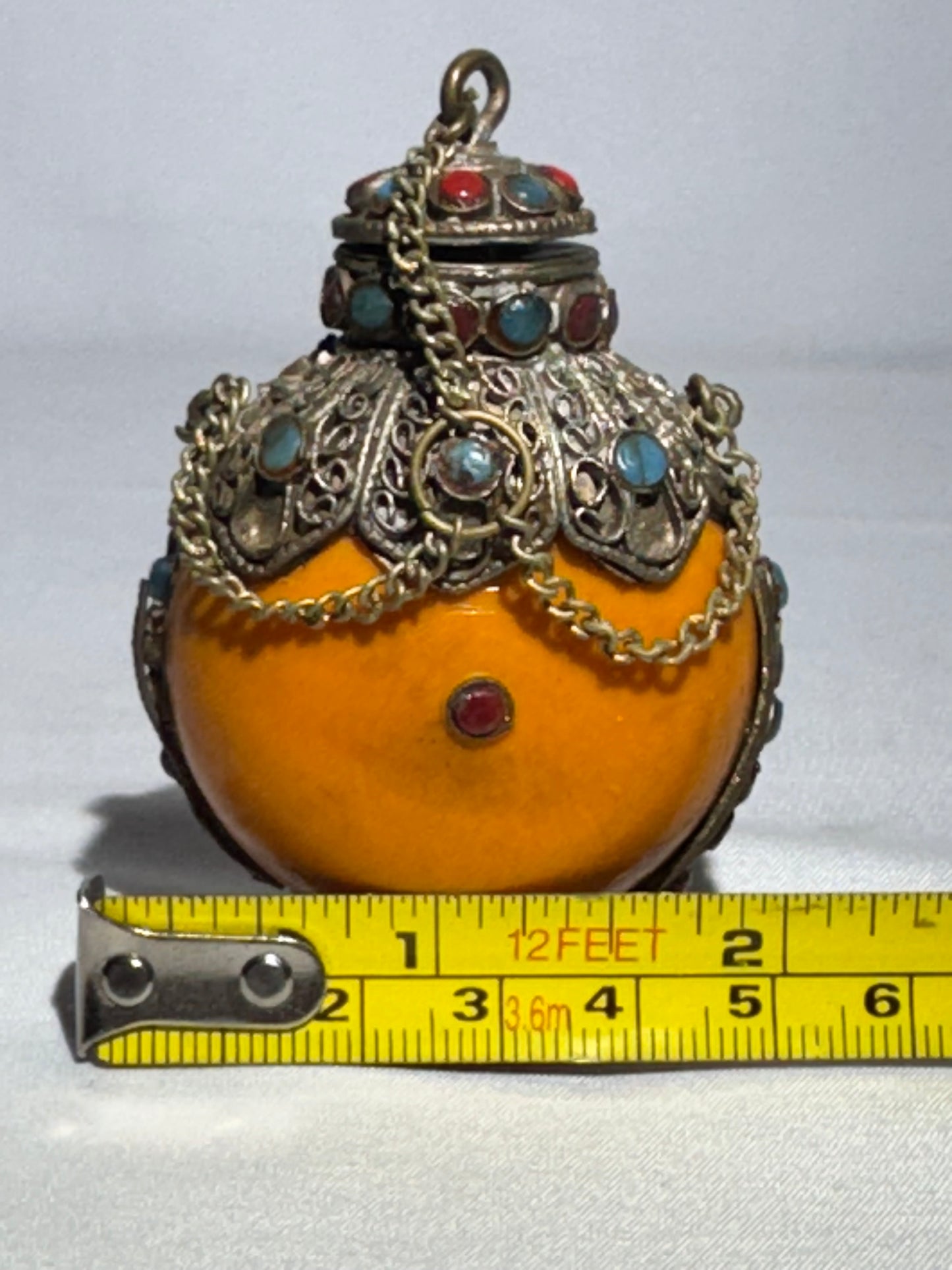 Antique Tibetan Silver Snuff Bottle with Coral and Turquoise Inlay – Ornate Metalwork & Chain Stopper