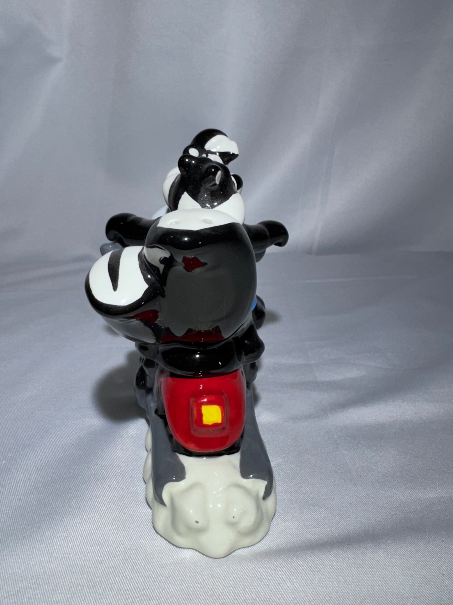 2009 Westland Looney Tunes Pepe Le Pew Penelope and motorcycle Magnetic Shakers Box