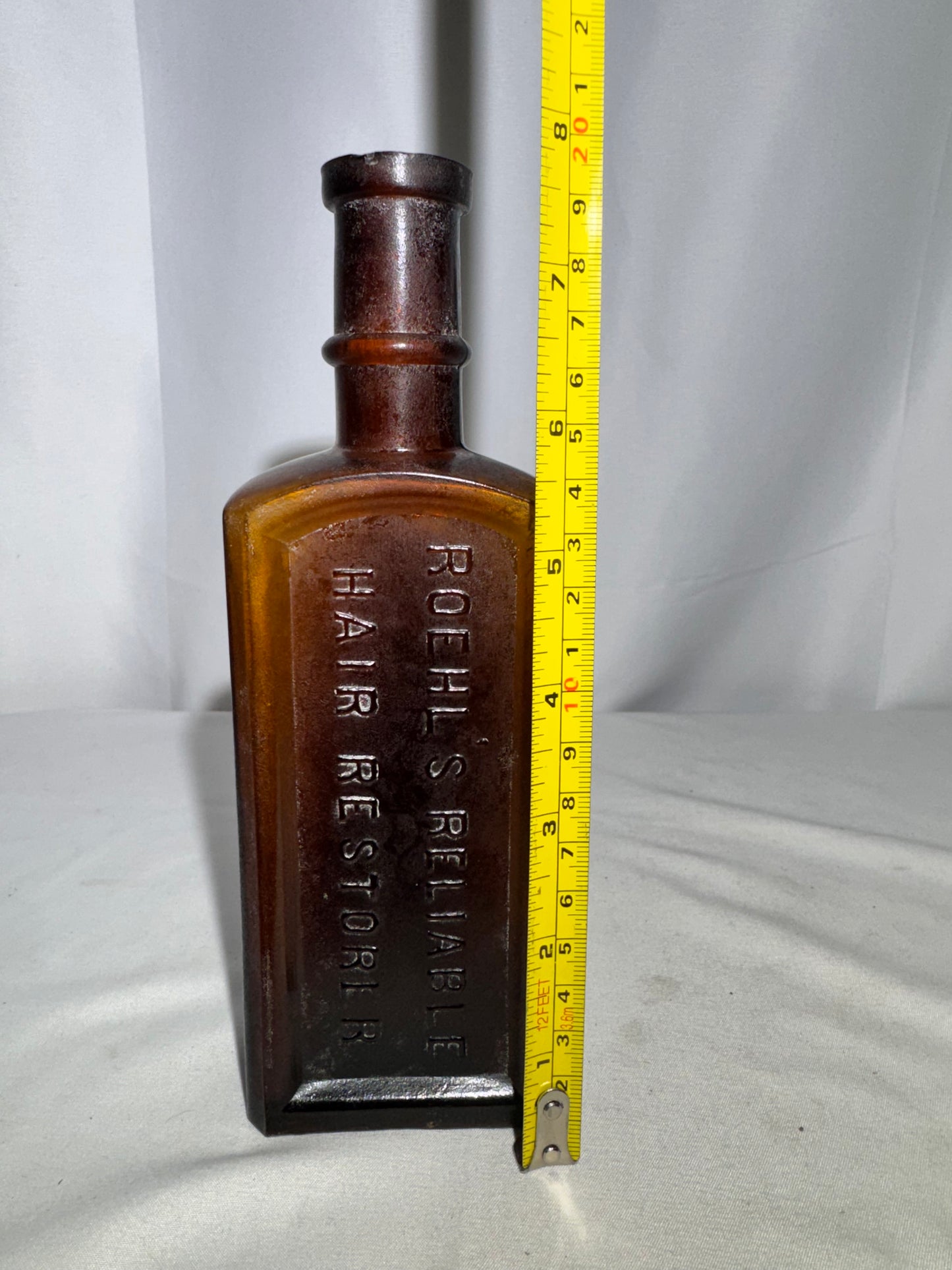Vintage Amber Glass Apothecary Bottle Roehl’s Reliable Hair Restorer Embossed Antique