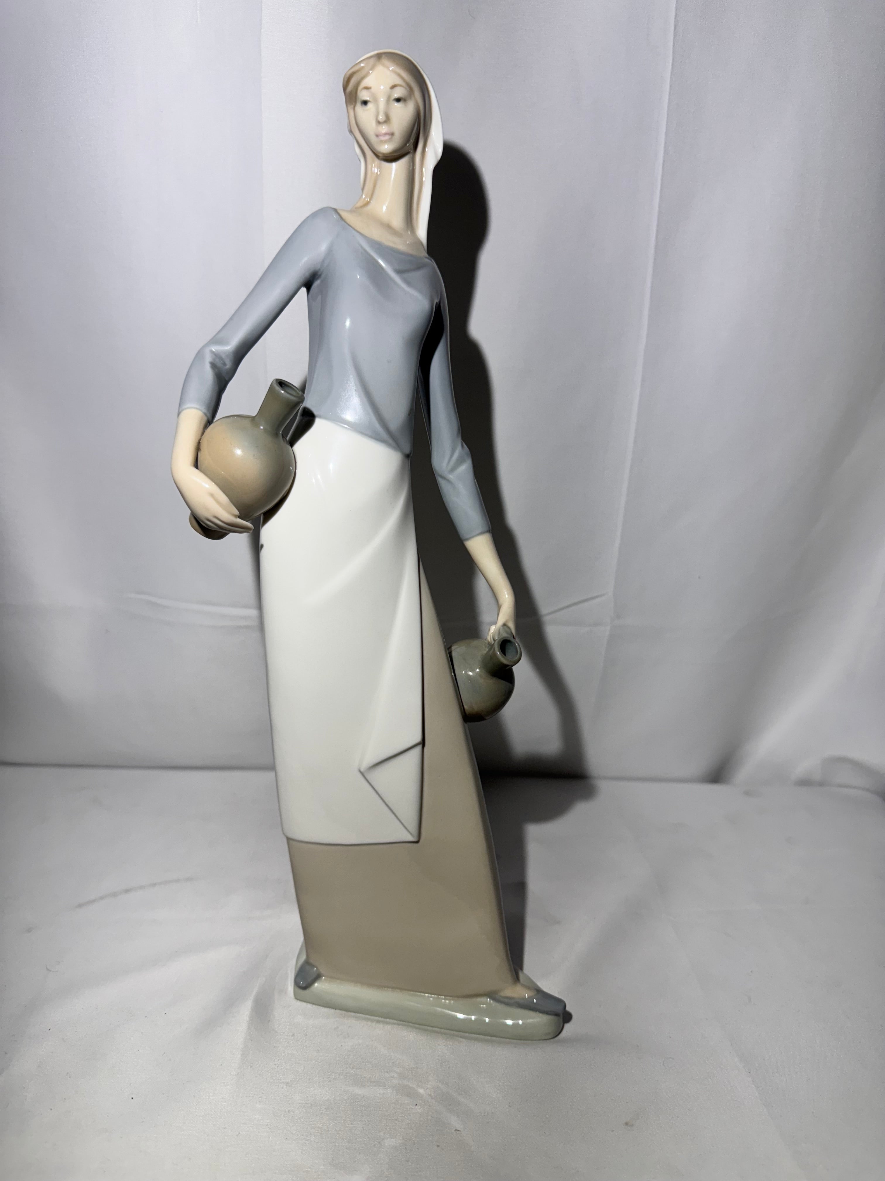 Lladro NAO Porcelain Figurine – “The Jug Carrier” (Water Carrier