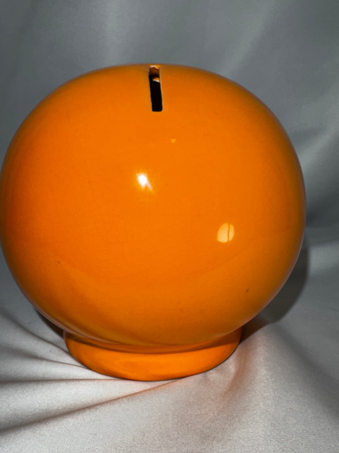 Vintage orange Smiley Face Ceramic Coin Bank