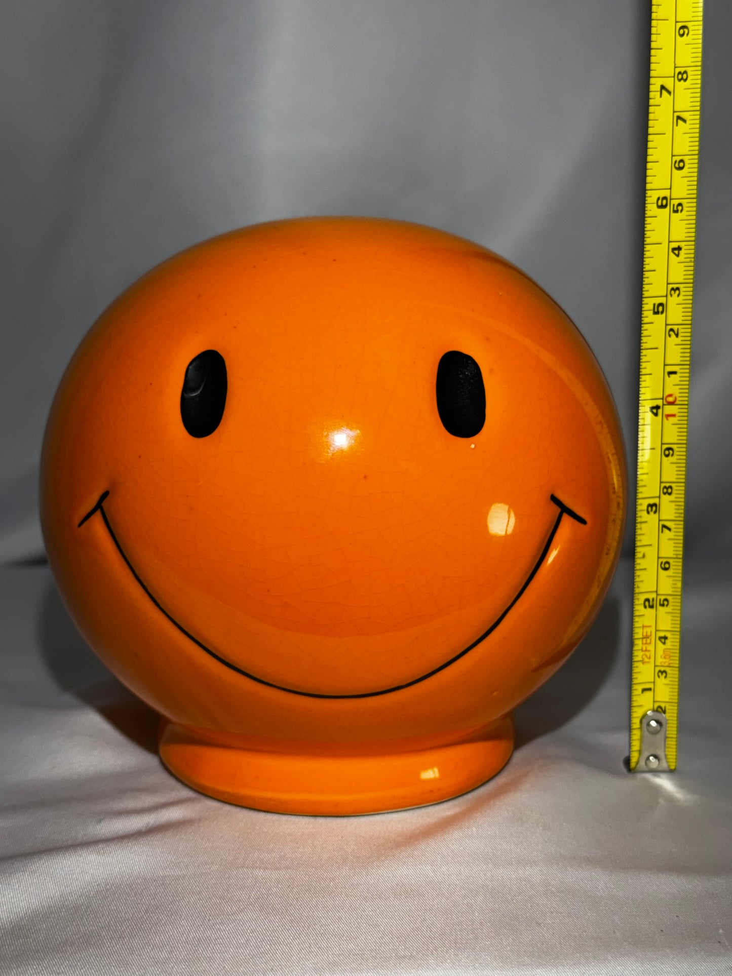 Vintage orange Smiley Face Ceramic Coin Bank