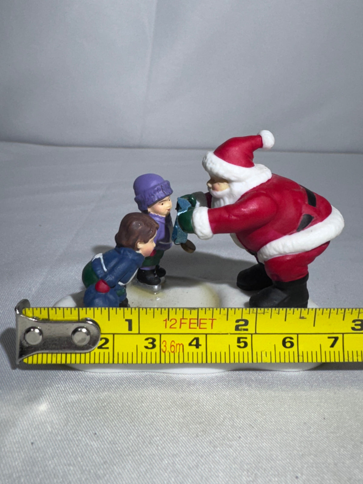 Department 56 North Pole Series Santa Awarding a Medal Replacement Figurine – 2002