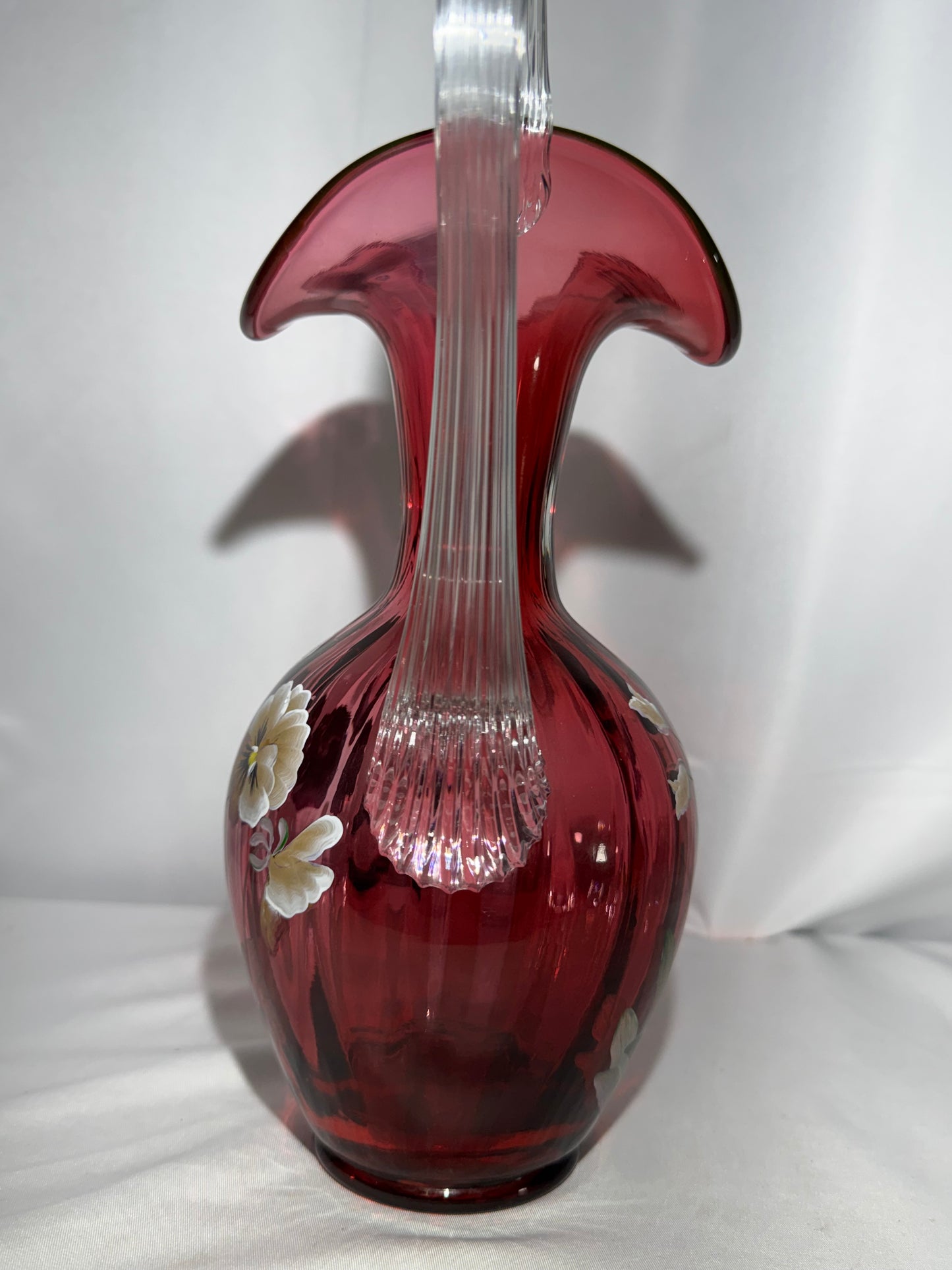 Fenton Art Glass Cranberry “Pansies” Hand-Painted Pitcher – 10.5” Fluted Ribbon Handle