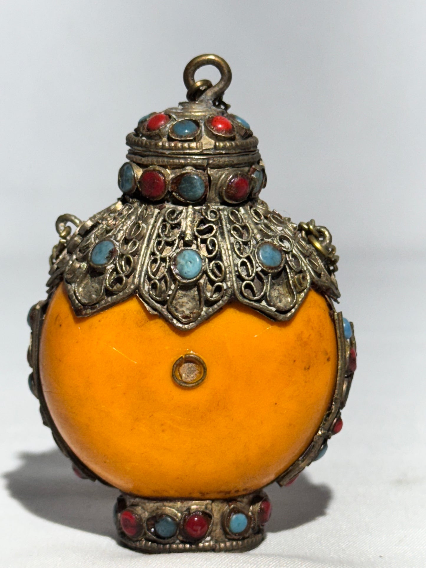 Antique Tibetan Silver Snuff Bottle with Coral and Turquoise Inlay – Ornate Metalwork & Chain Stopper
