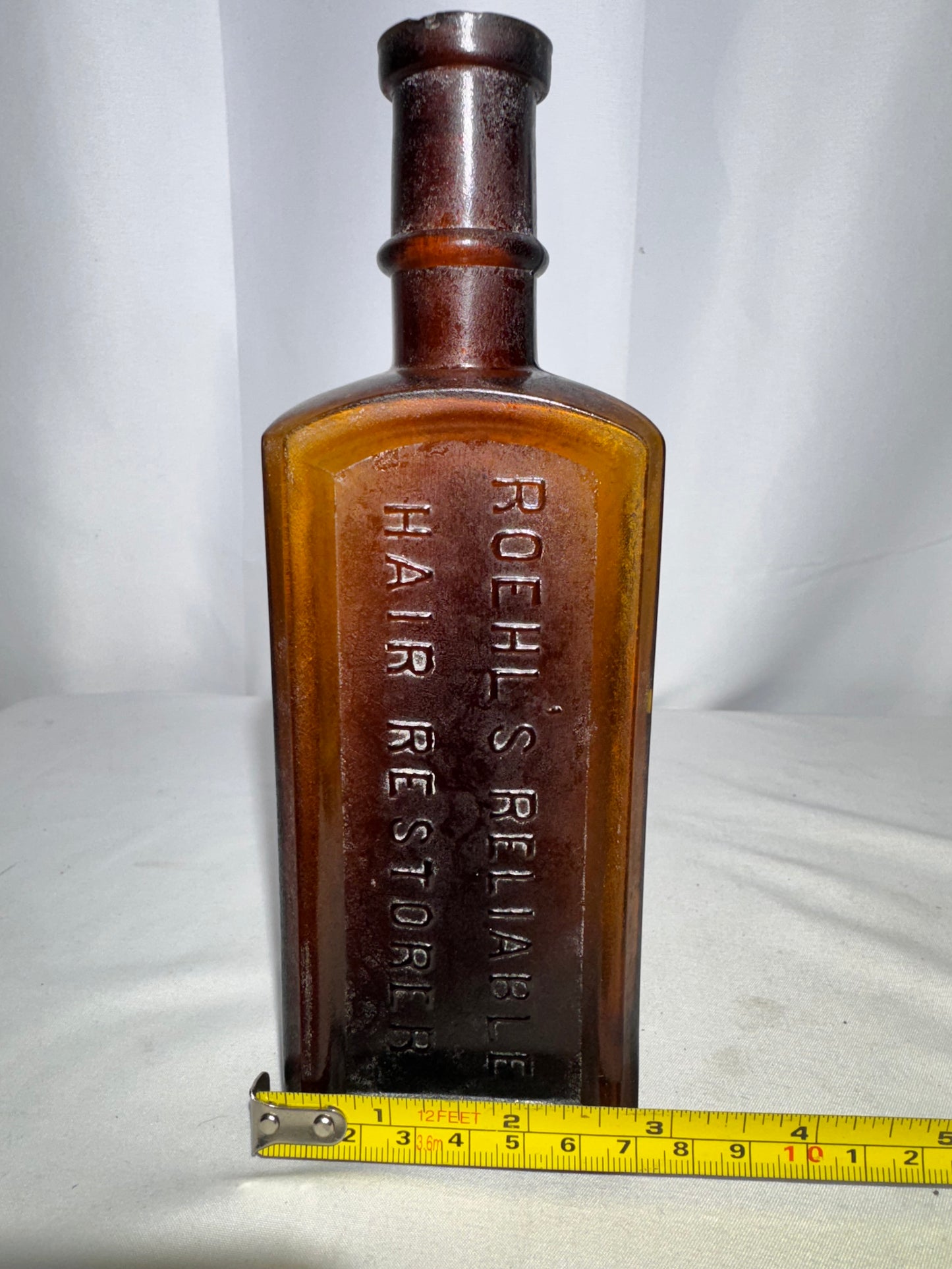 Vintage Amber Glass Apothecary Bottle Roehl’s Reliable Hair Restorer Embossed Antique