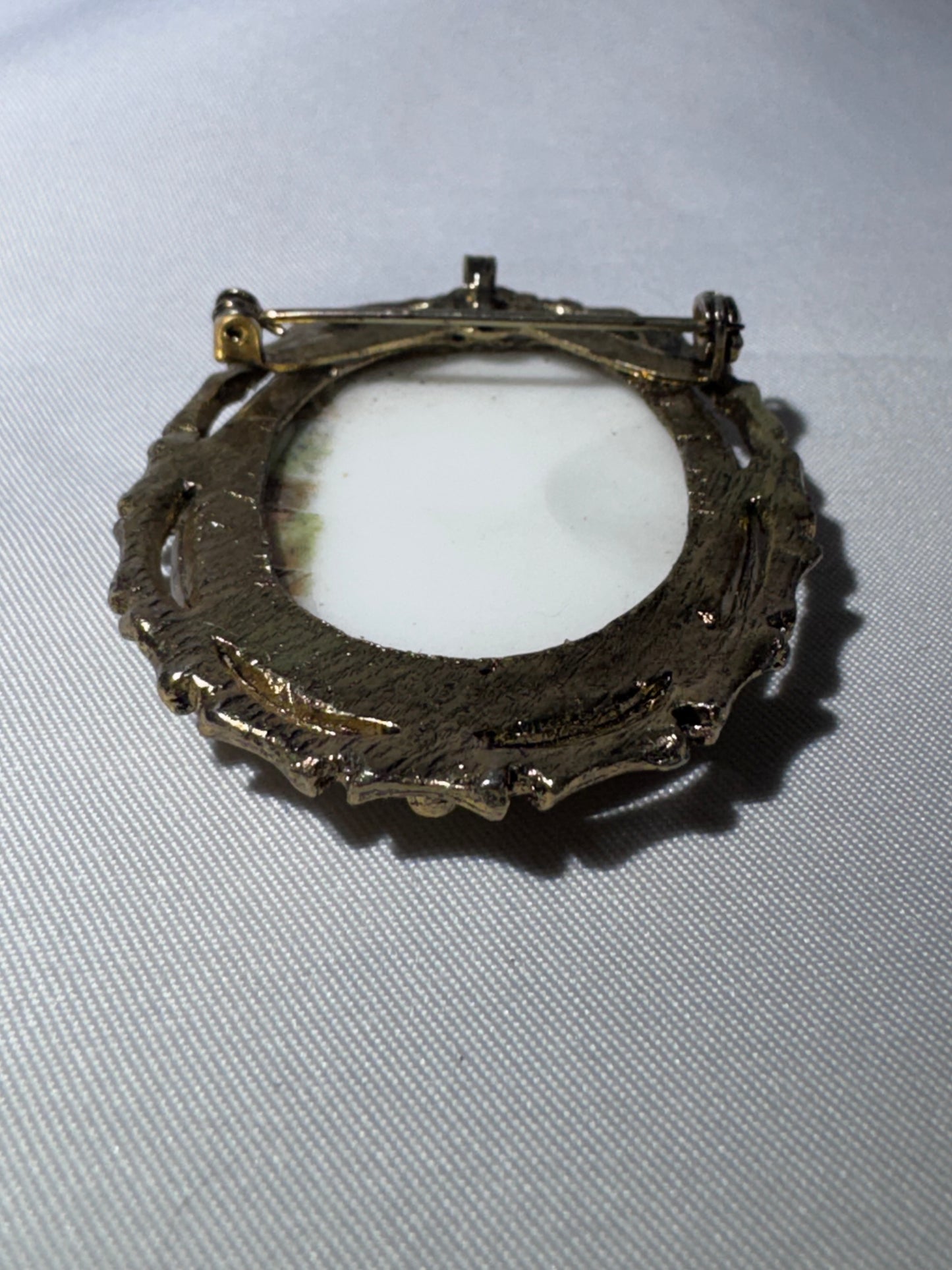 Vintage French Limoges Porcelain Miniature Brooch – Classical Mythology Scene – Ornate Gold-Tone Frame