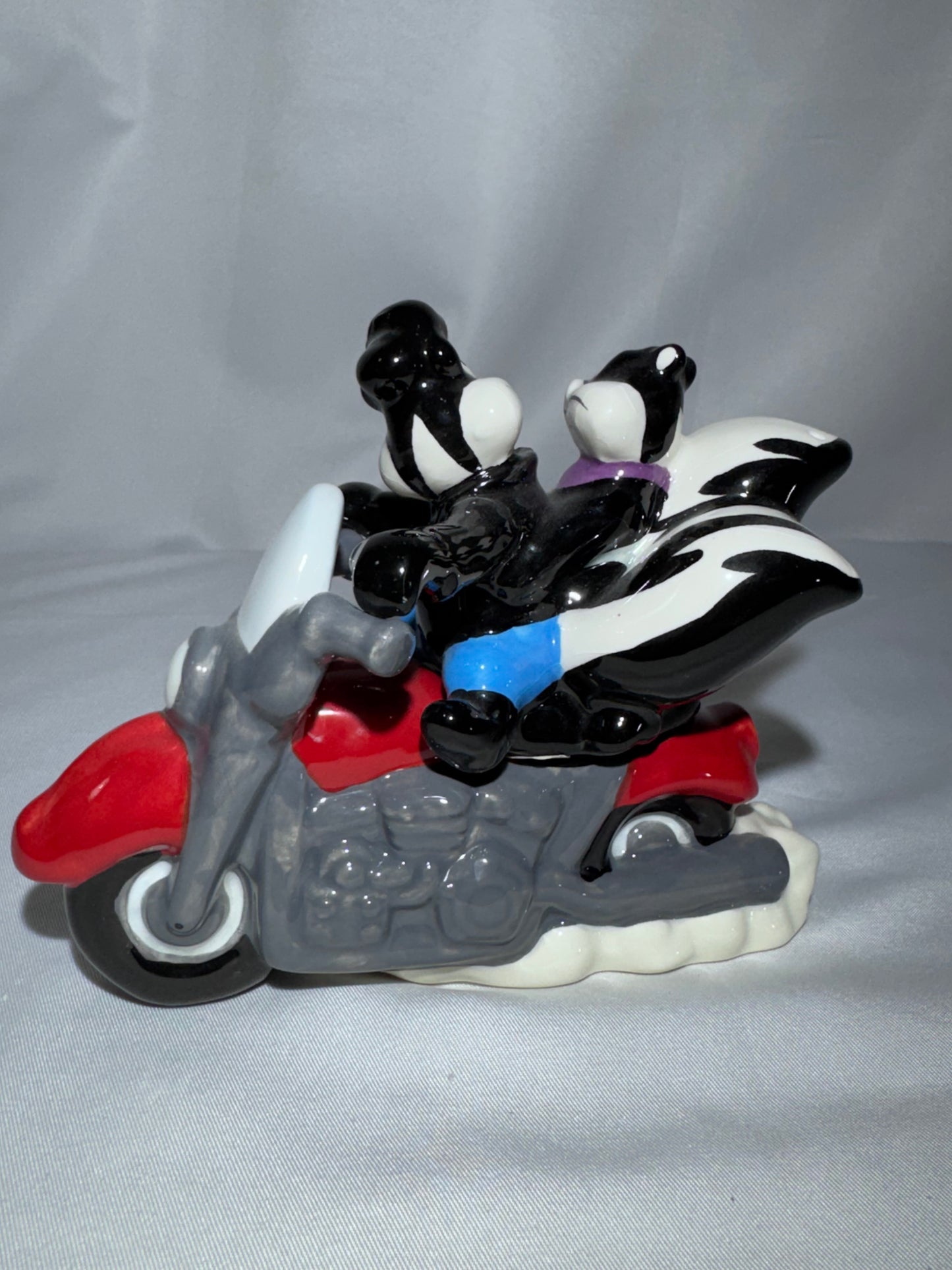 2009 Westland Looney Tunes Pepe Le Pew Penelope and motorcycle Magnetic Shakers Box