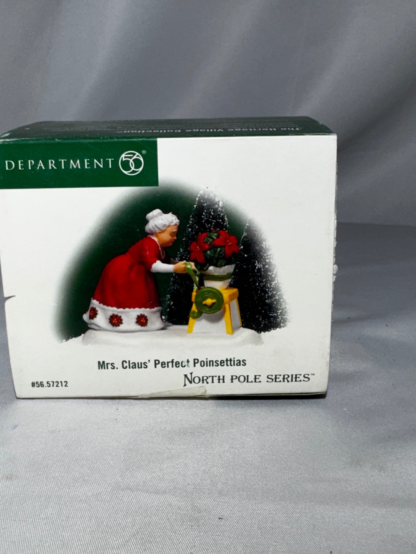 Department 56 Mrs. Claus’ Perfect Poinsettias #56.57212 North Pole Retired