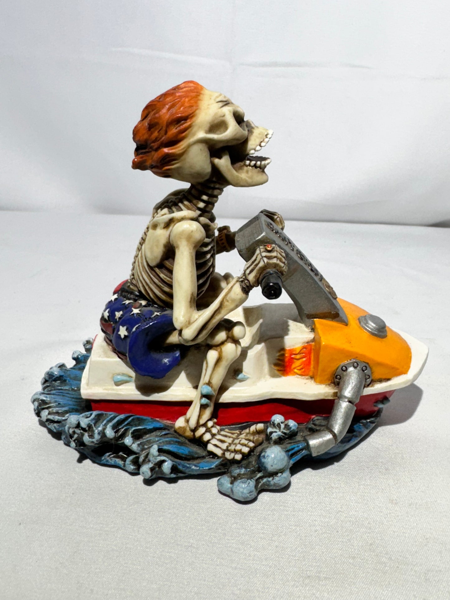 Summit Collection Skeleton “Can’t Stop” Jet Ski Figurine – American Flag Swim Shorts